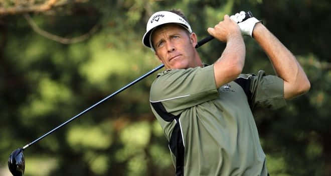 Stuart Appleby Swinging A Golf Club Background