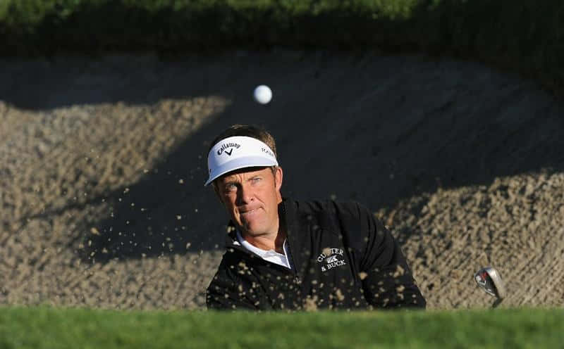 Stuart Appleby Watching A Golf Ball After Teeing Background