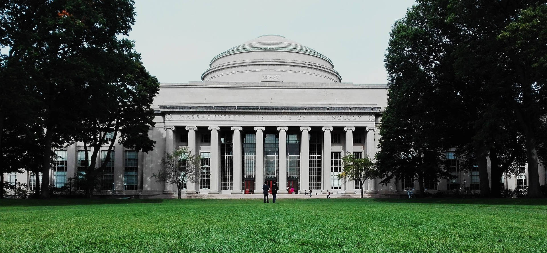 Students And Scholars Gathering At Mit's Great Dome Background