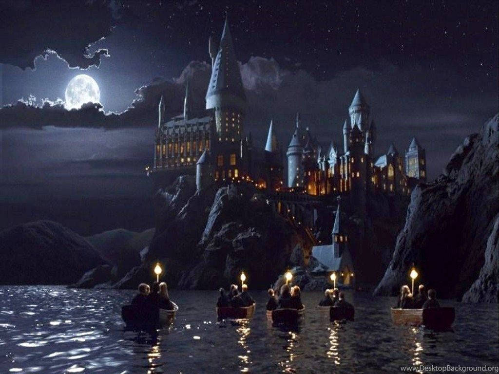 Students On Boats Hogwarts Background