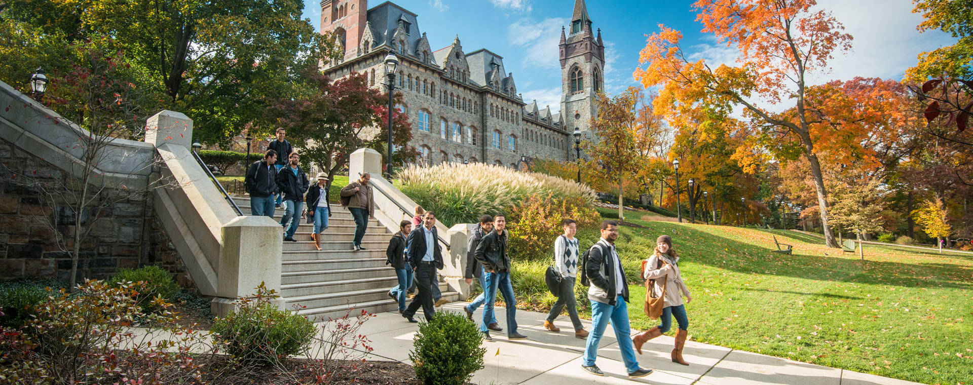 Students Socializing By Lehigh University Center Tower Background