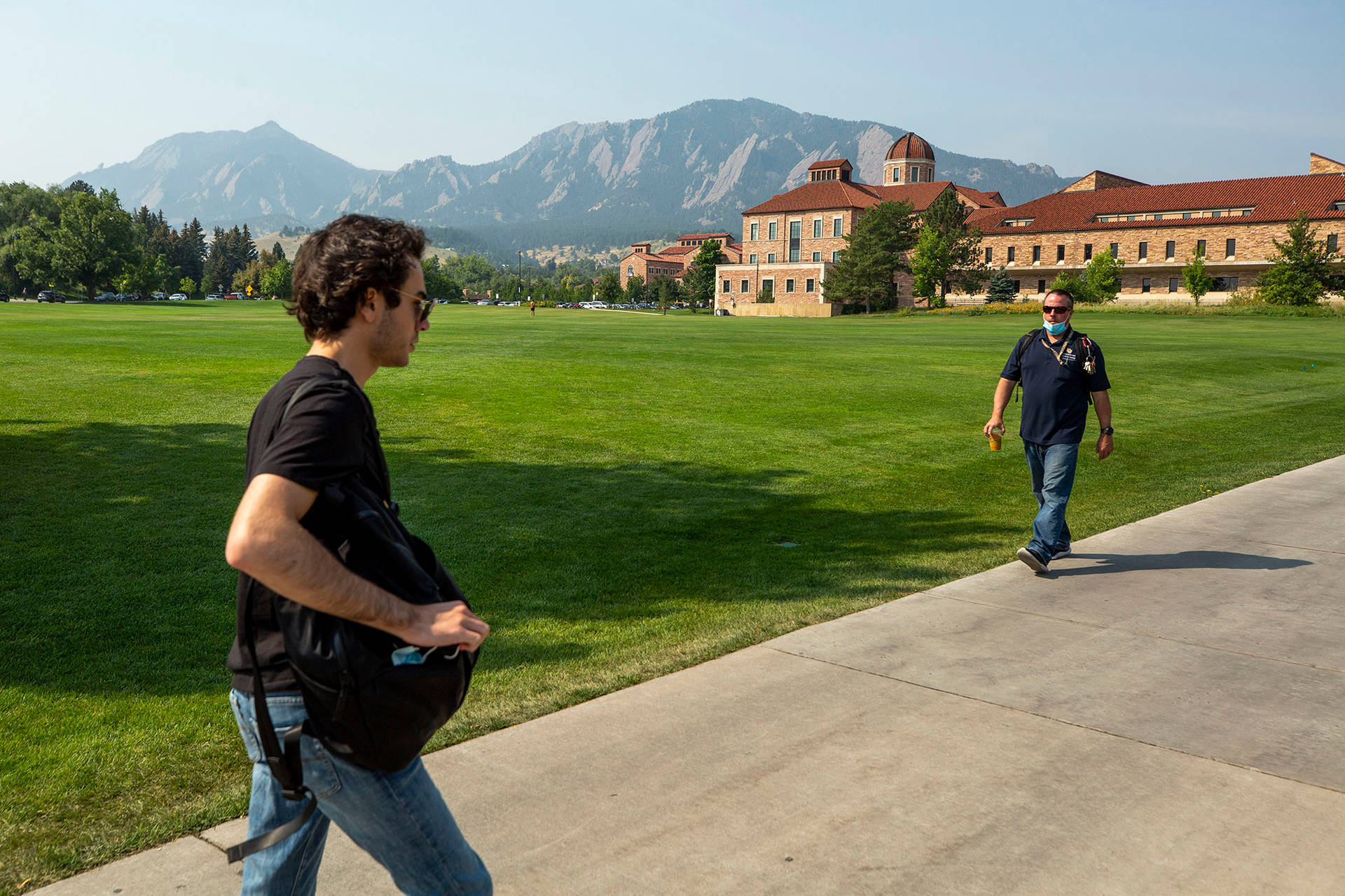 Students Walking In University Of Colorado Background