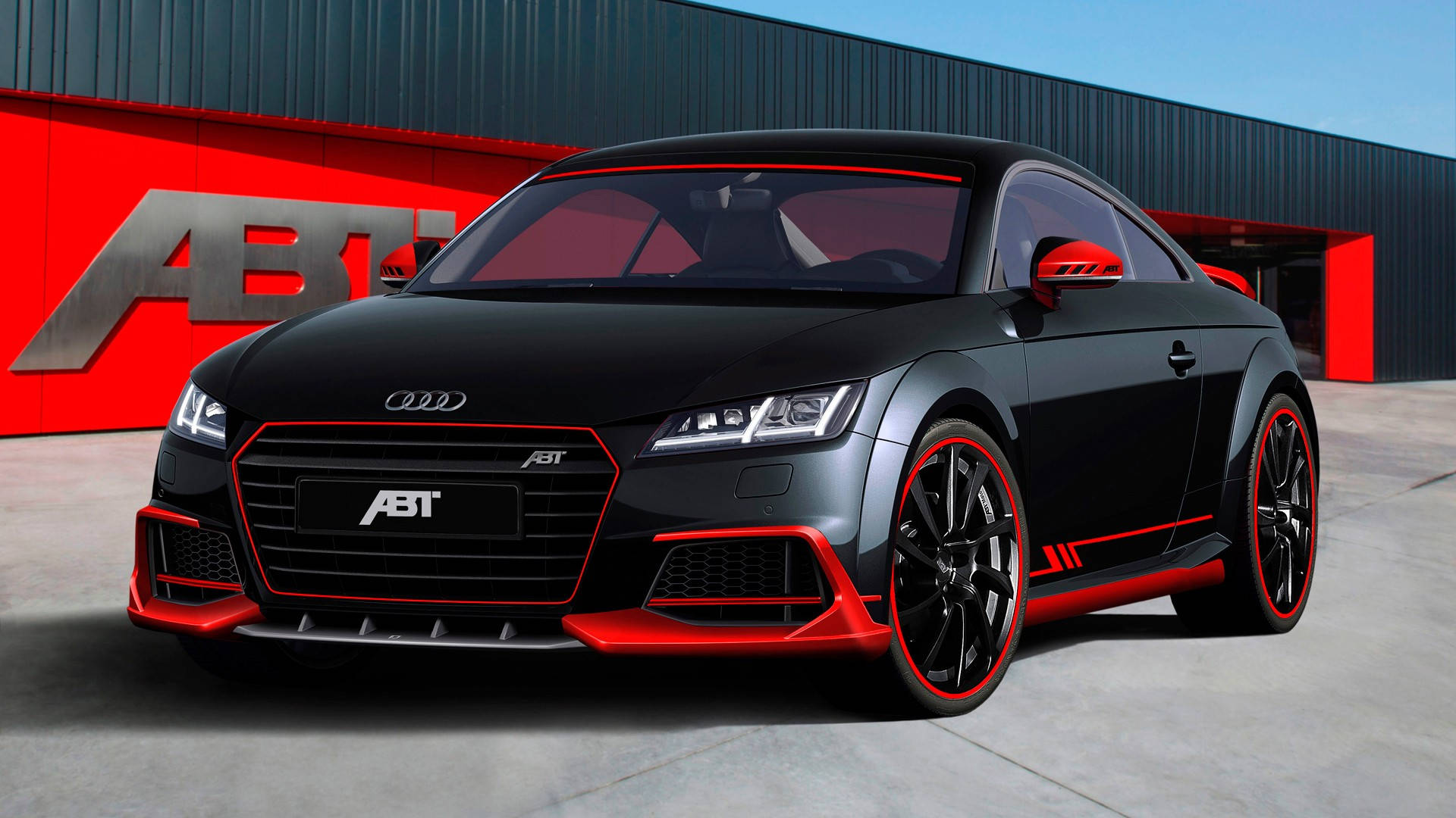 Stunning Black And Red Audi R8 Showcasing Power And Elegance Background