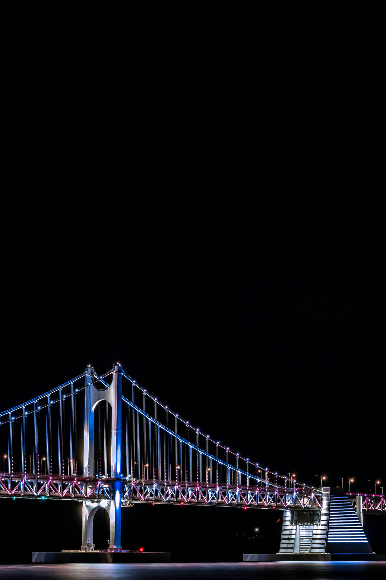 Stunning Cable Bridge Illumination In Busan Background