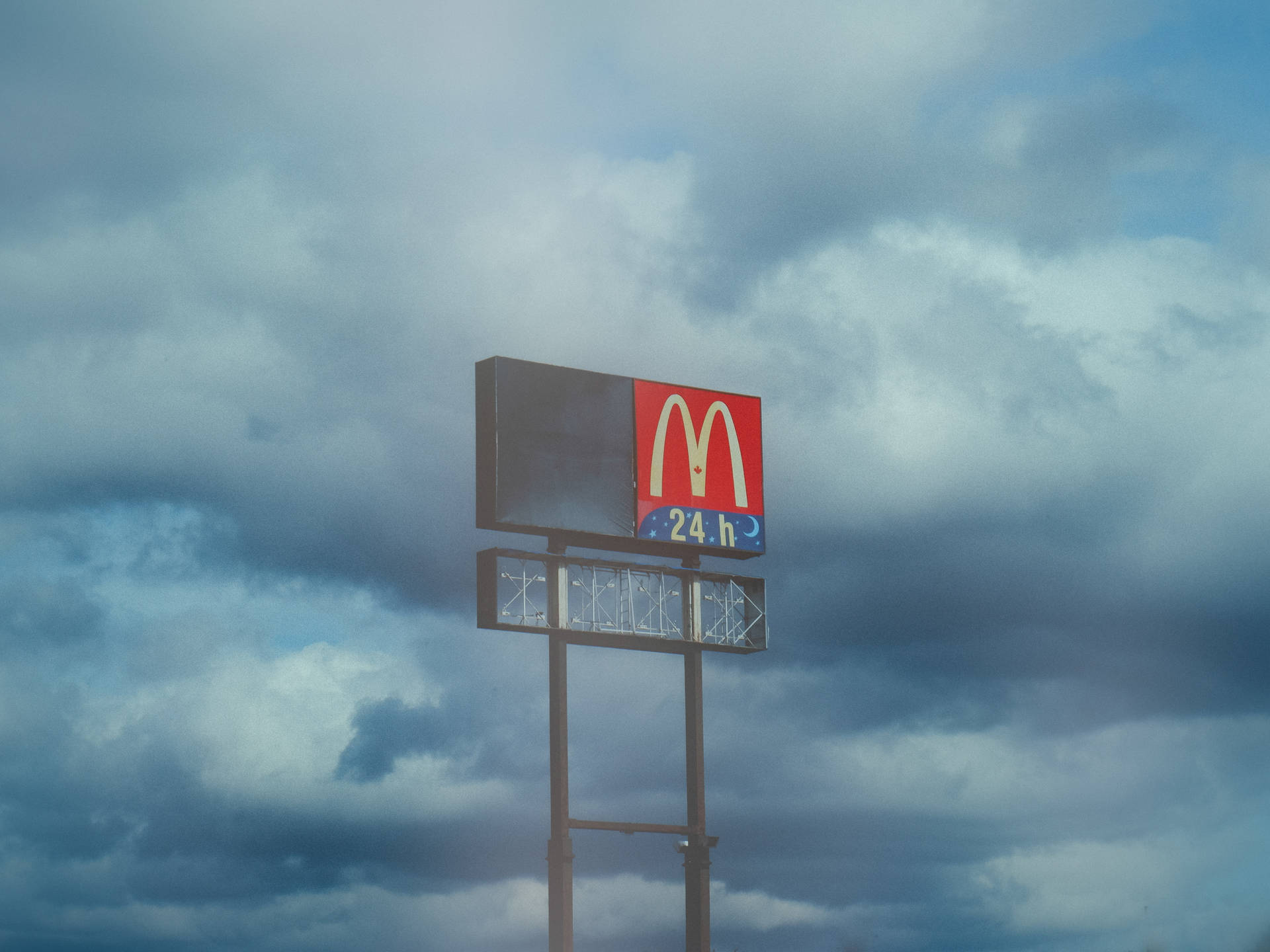 Stunning Cloud Aesthetic With Iconic Mcdonald's Signage Background
