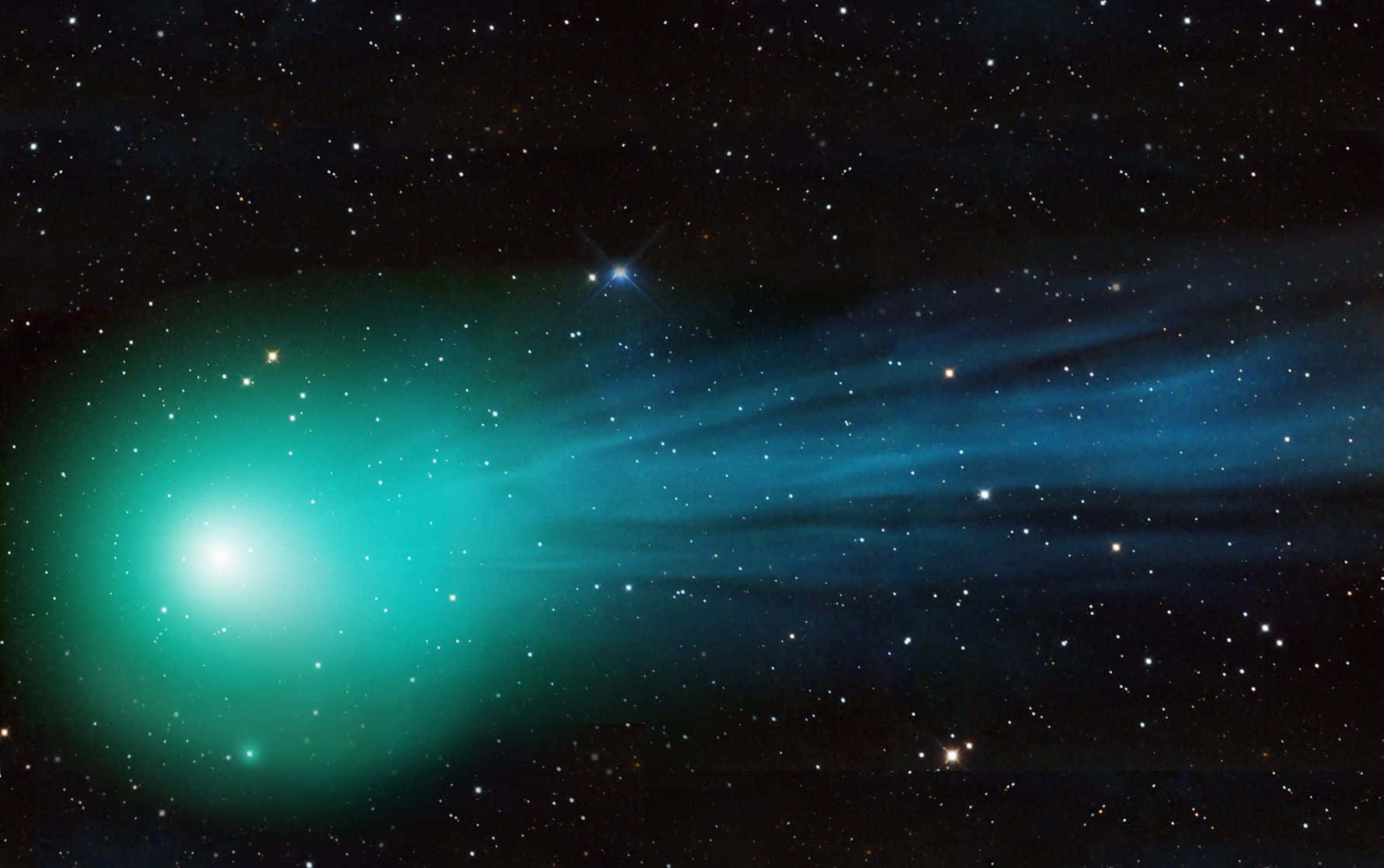 Stunning Comet In Night Sky Background