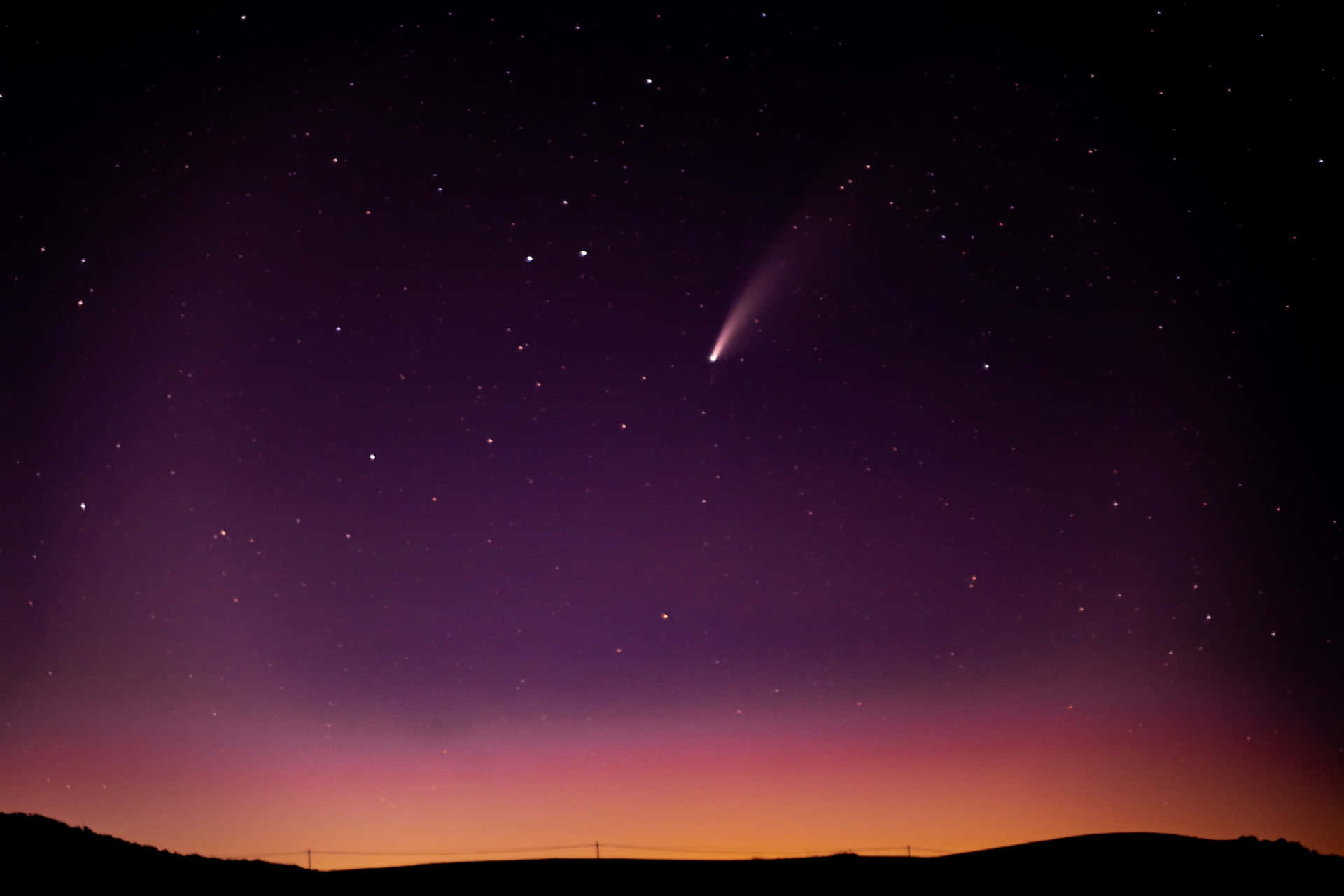 Stunning Comet Travelling Through The Star-studded Night Sky Background