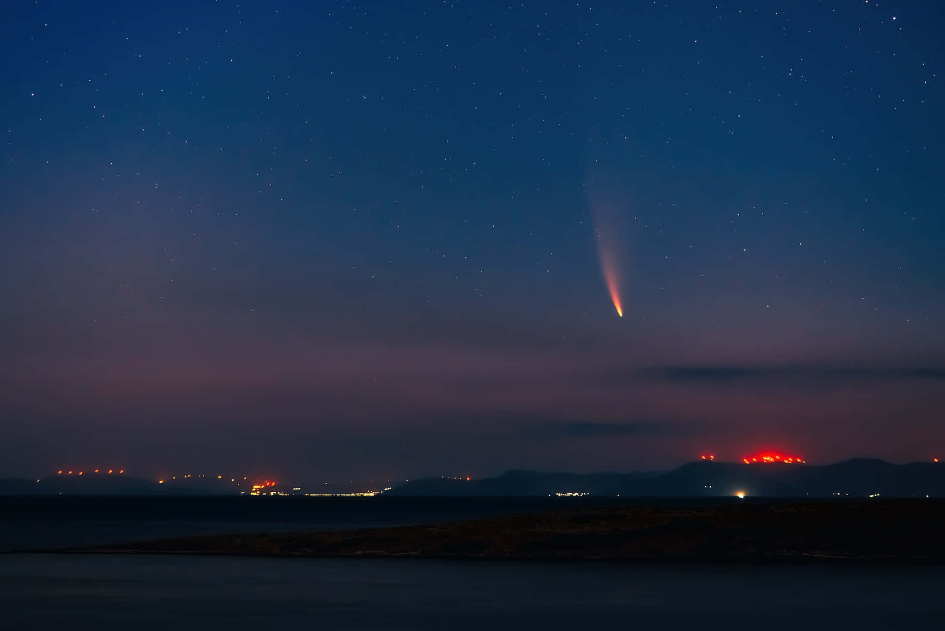 Stunning Cosmic Comet Illuminating The Night Sky