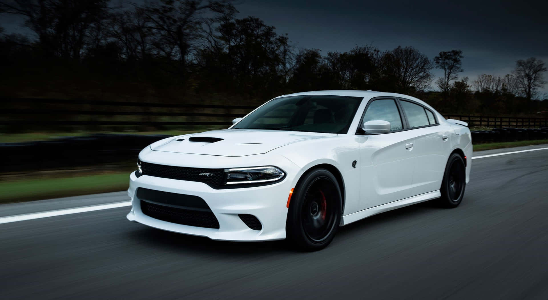 Stunning Dodge Charger In Action Background