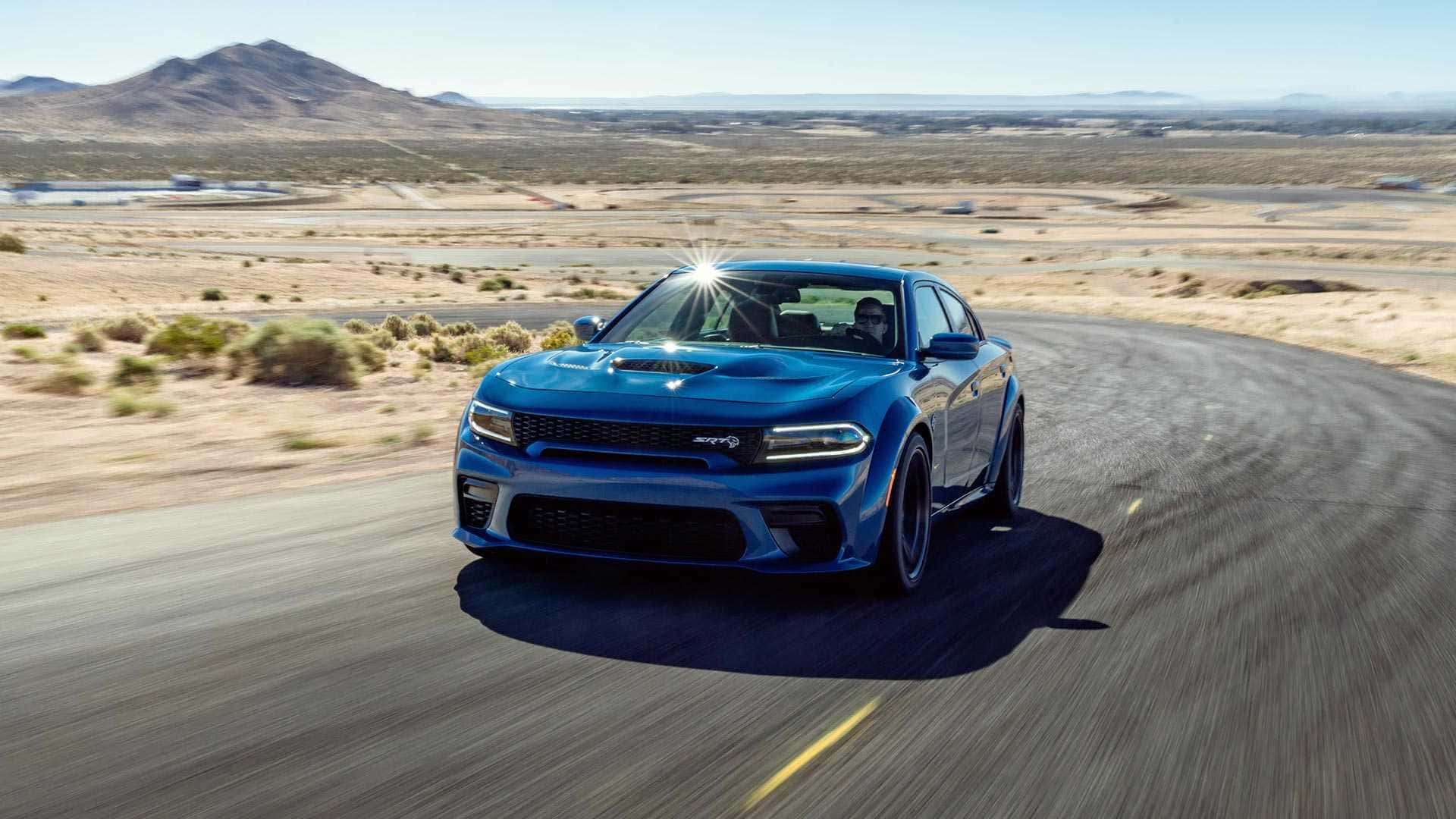 Stunning Dodge Charger On The Road Background