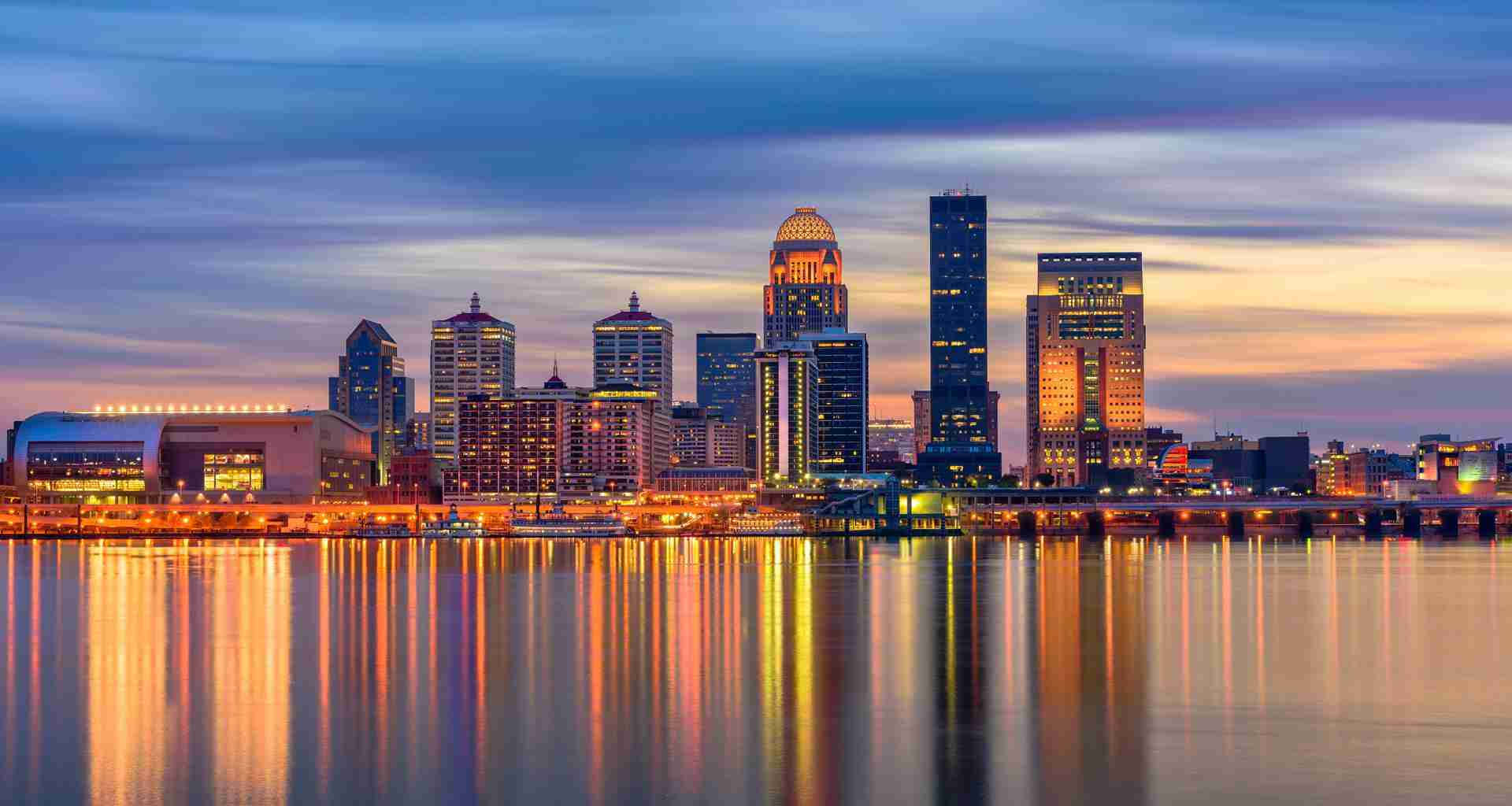 Stunning Louisville City Lights At Twilight Background