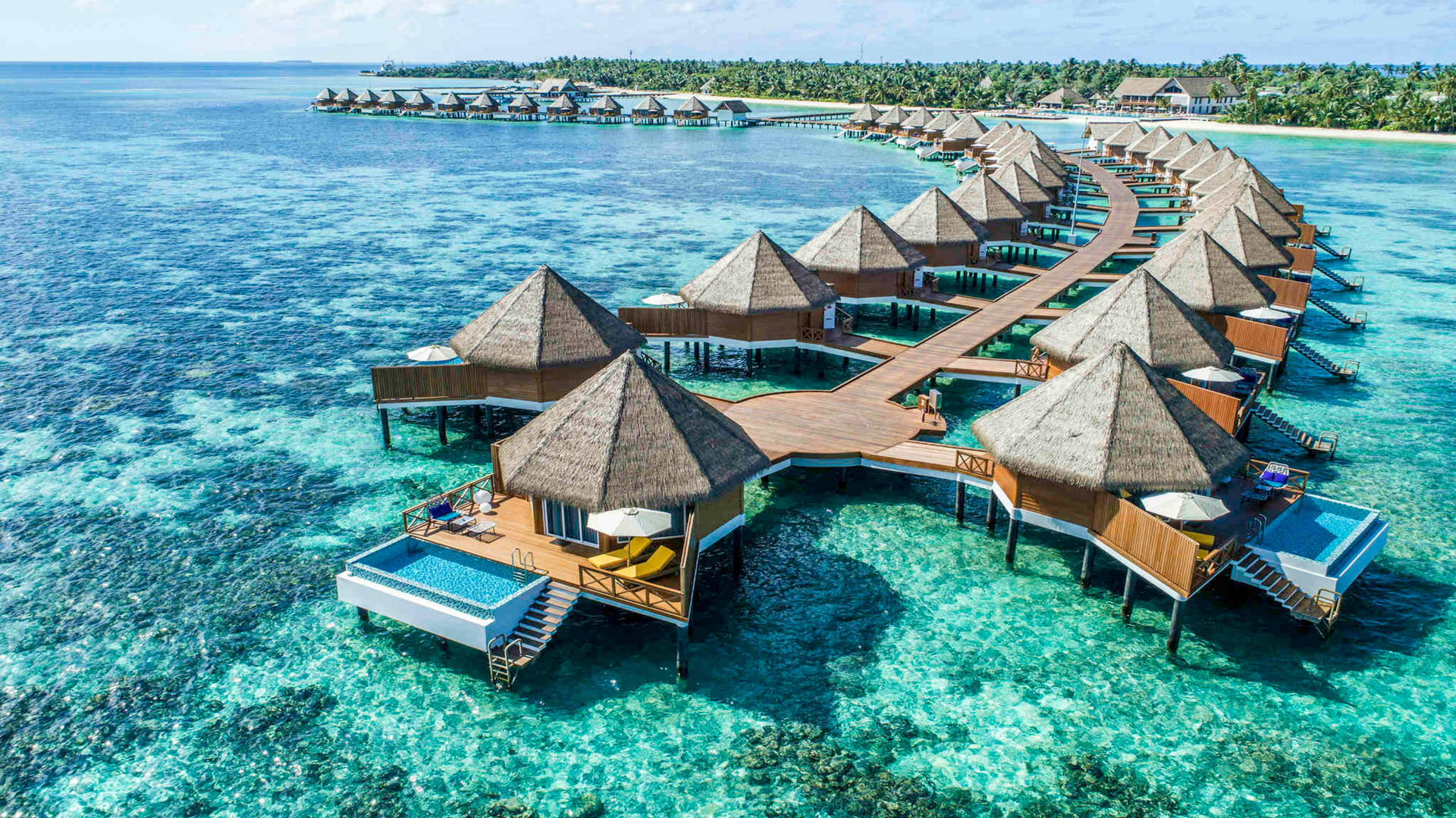 Stunning Luxury Villas In The Majestic Maldives Background