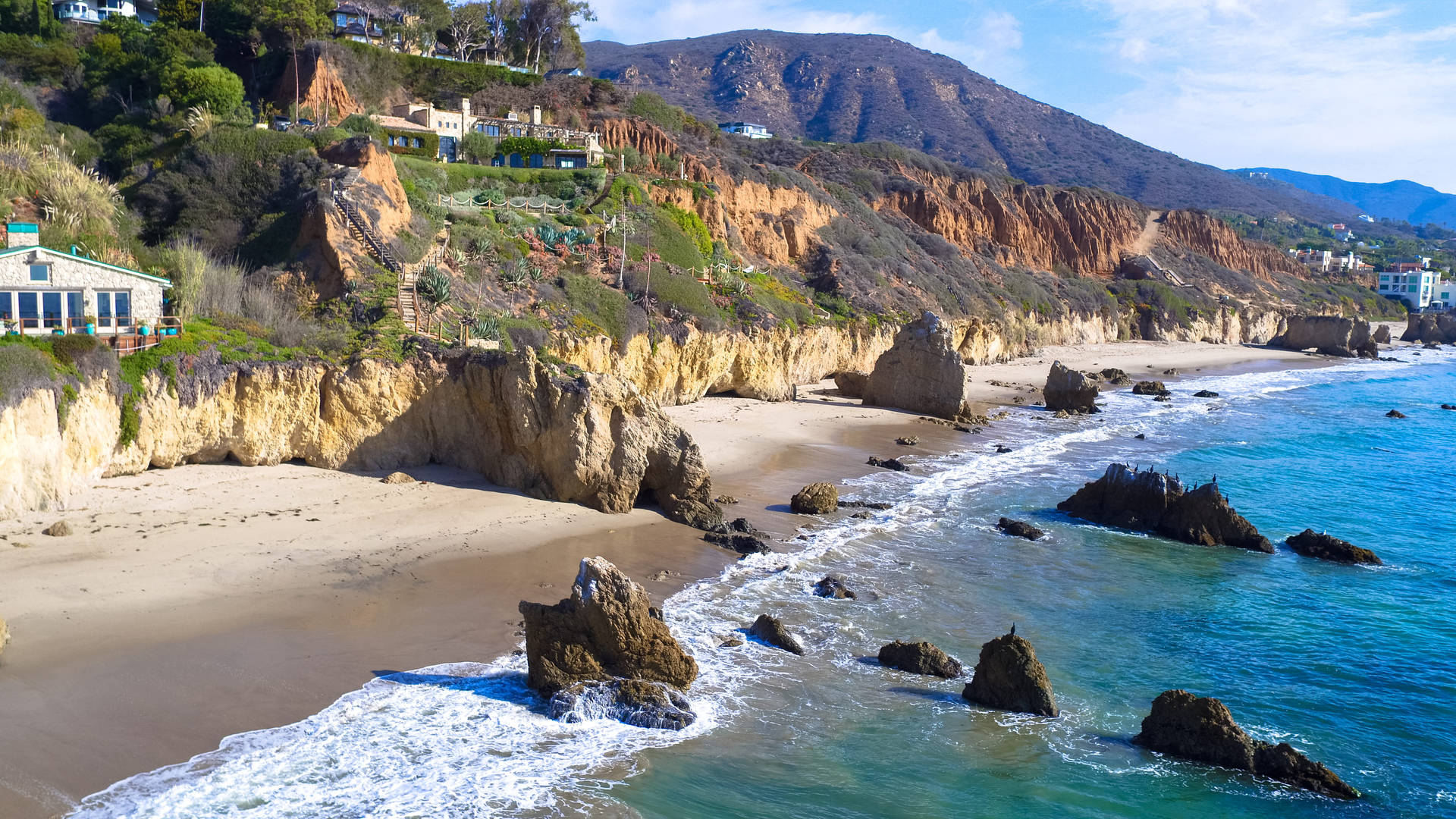 Stunning Malibu Beach Shoreline Background