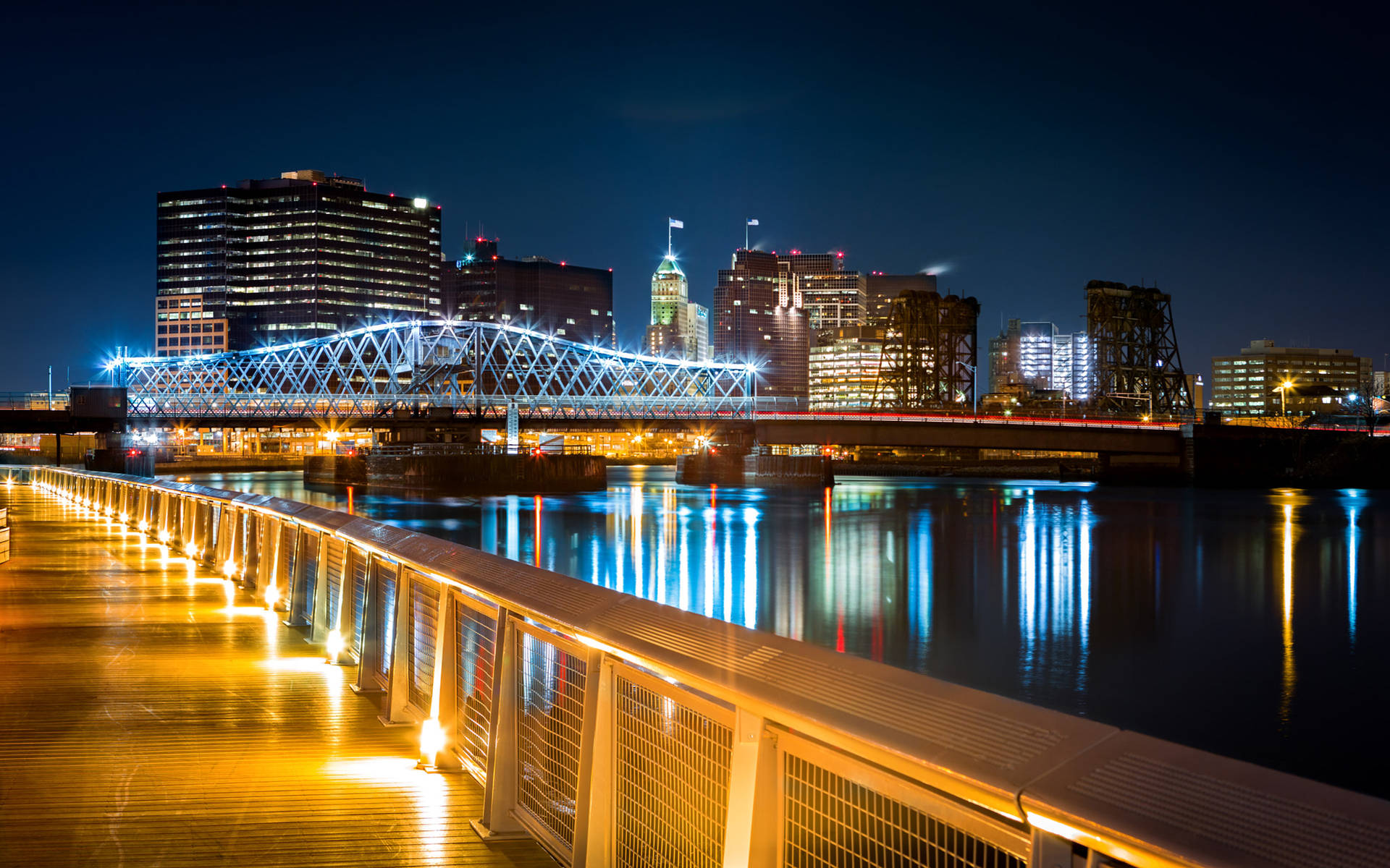 Stunning Night View Of Newark's Jackson Street Bridge Background