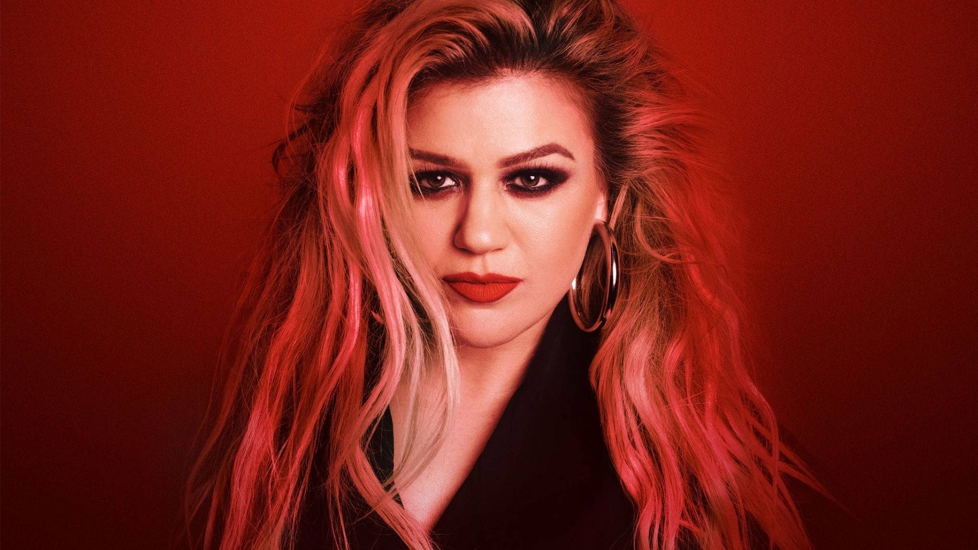 Stunning Portrait Of Kelly Clarkson In Vibrant Red Dress Background
