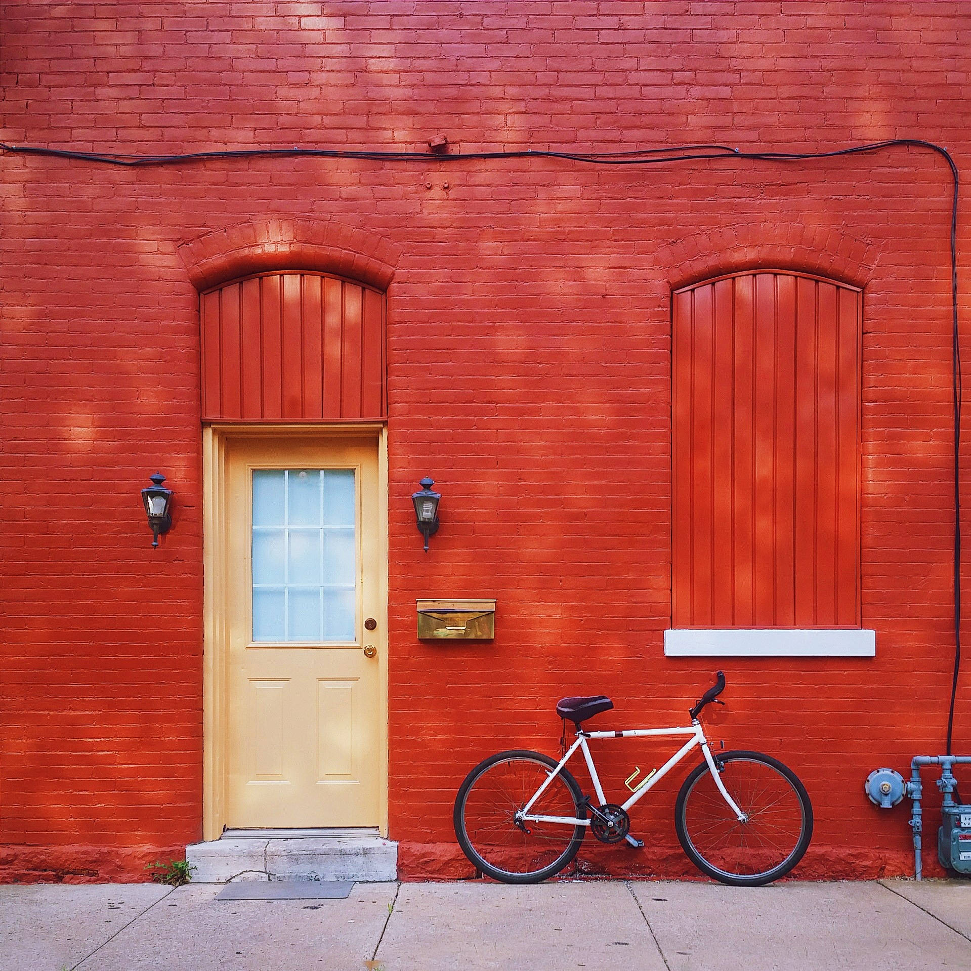 Stunning Red Building And Bicycle