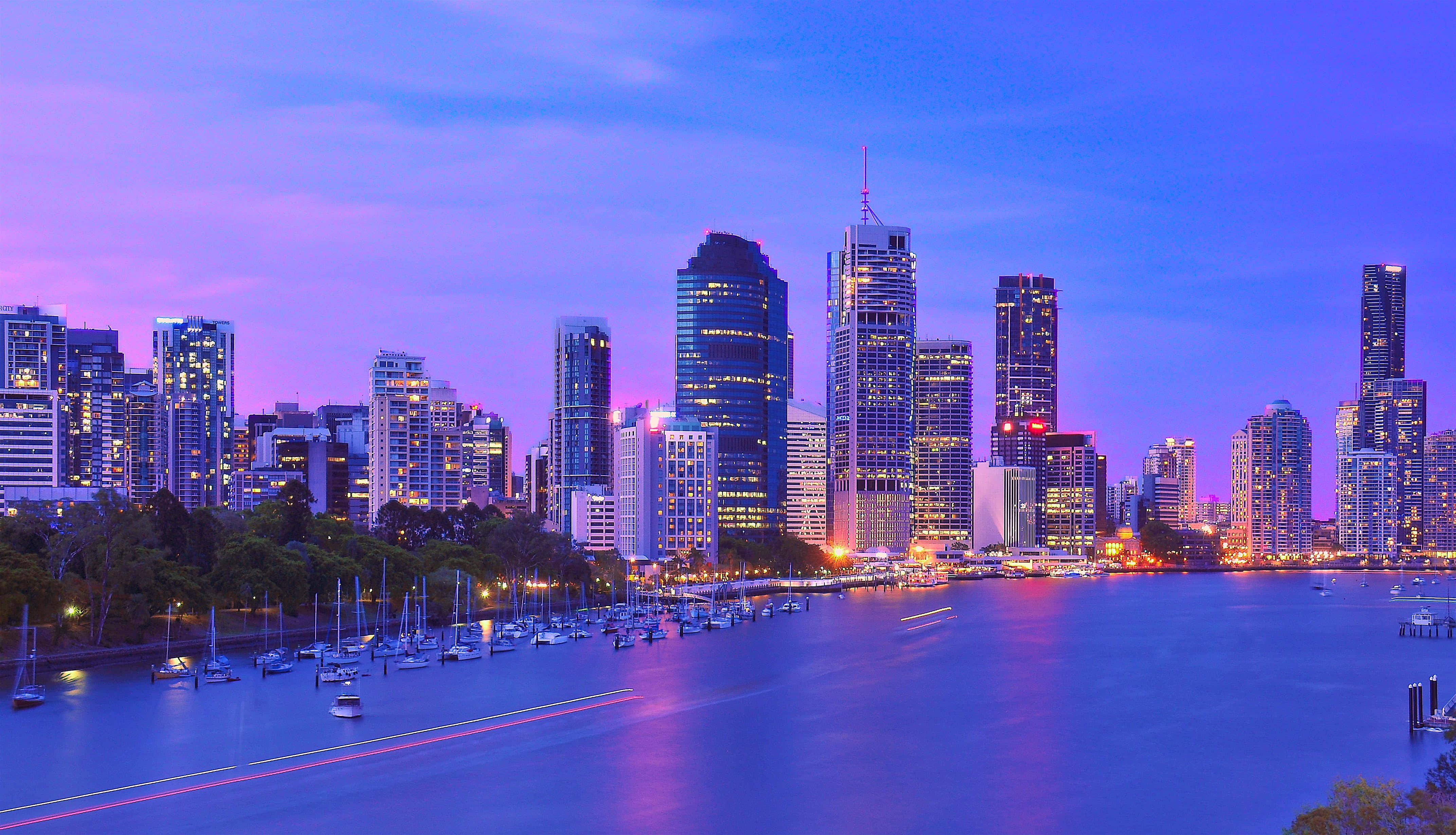 Stunning Twilight Skyline Of Brisbane City Background