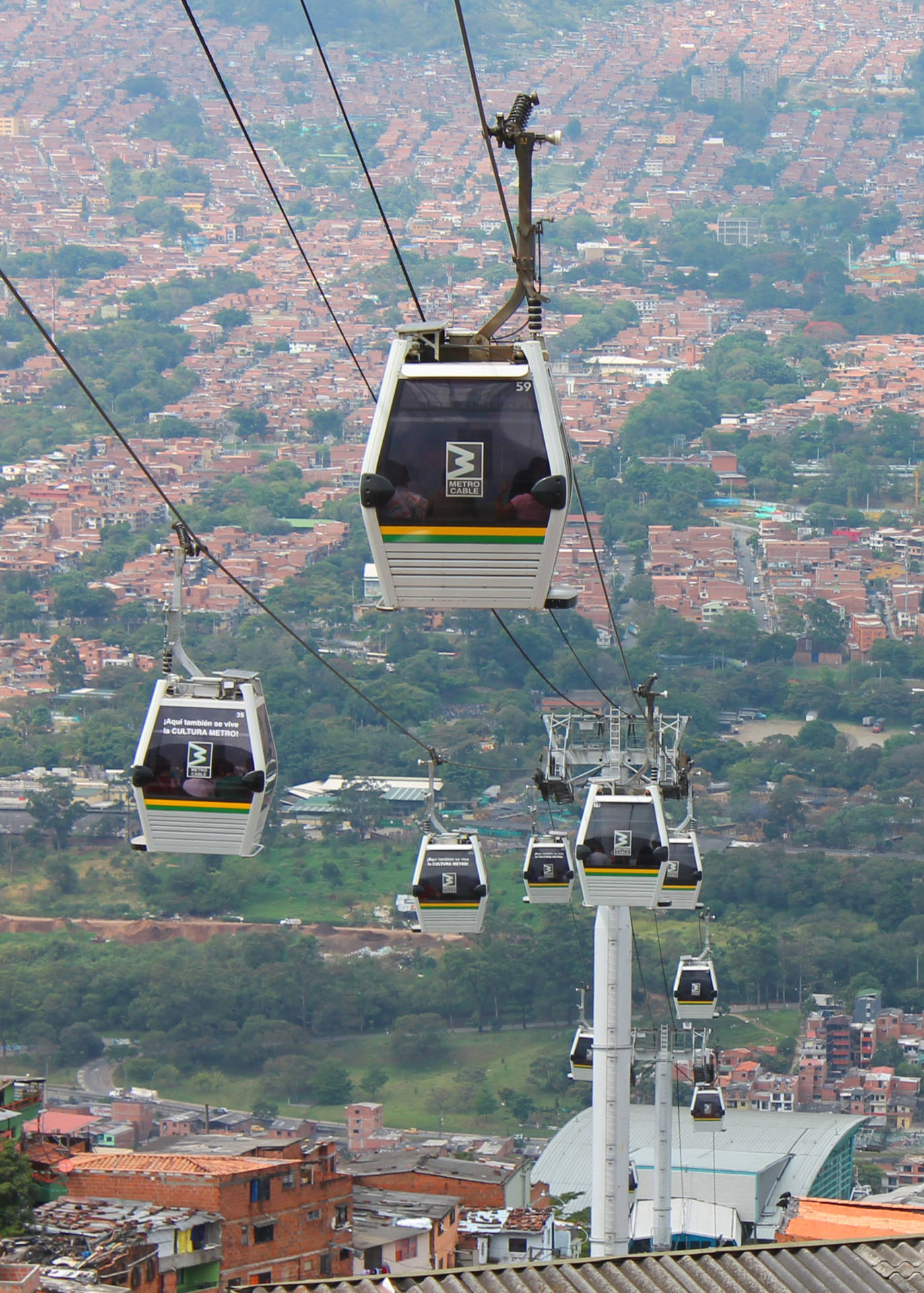Stunning View Of Medellín's Metrocable Against An Evening Sky Background
