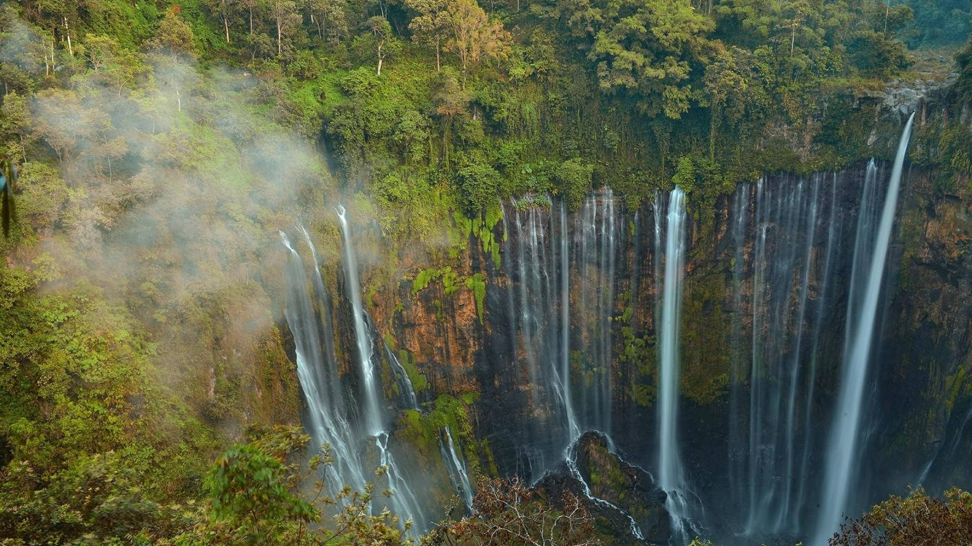 Stunning View Of Tumpak Sewu Waterfall, Indonesia Background