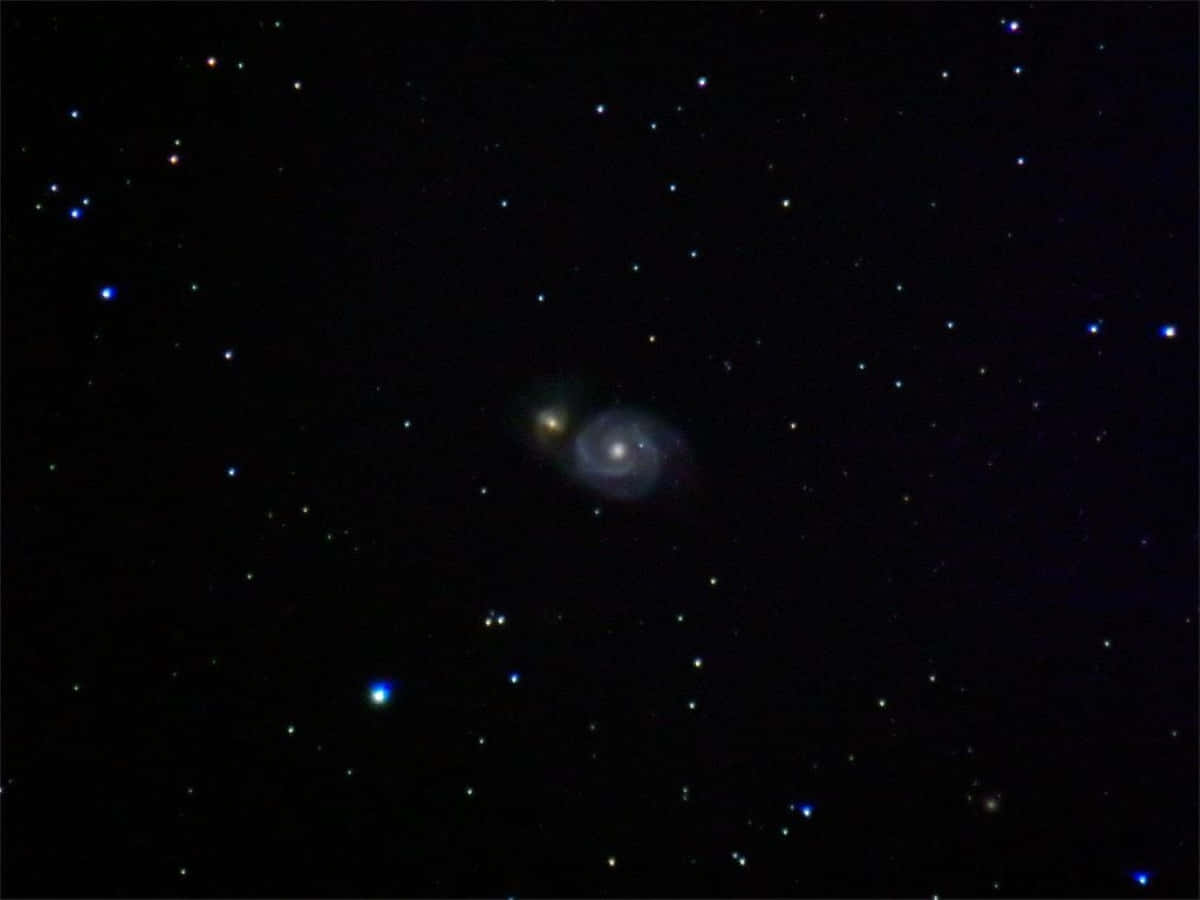 Stunning View Of Whirlpool Galaxy Background