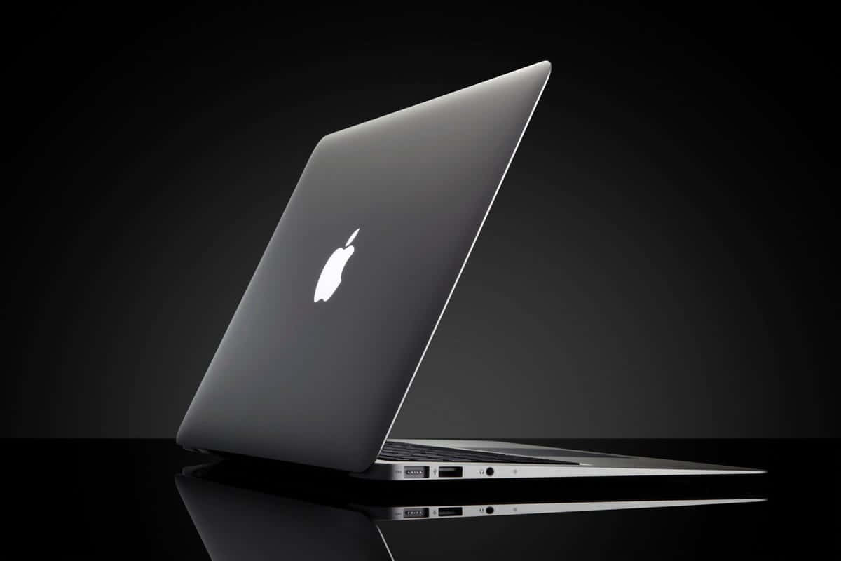 Stylish Black Macbook Laptop Background