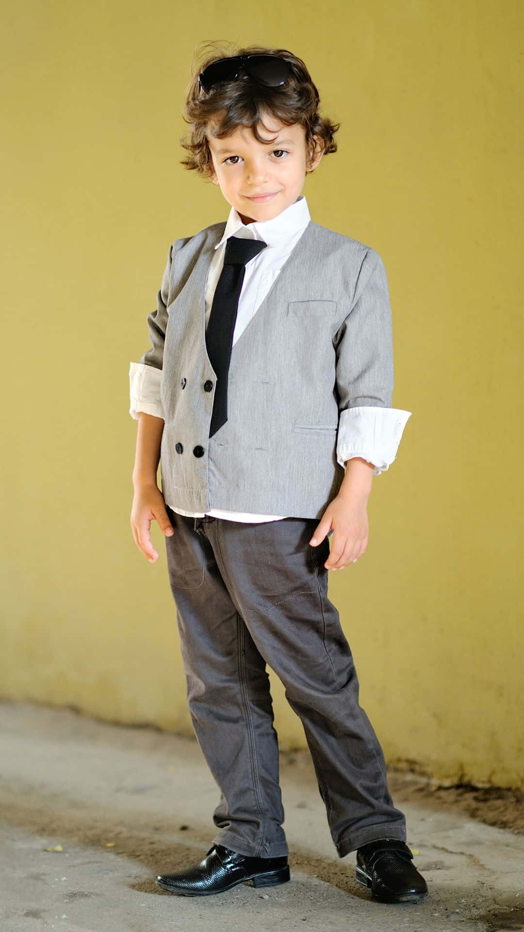 Stylish Boy In Formal Attire Background