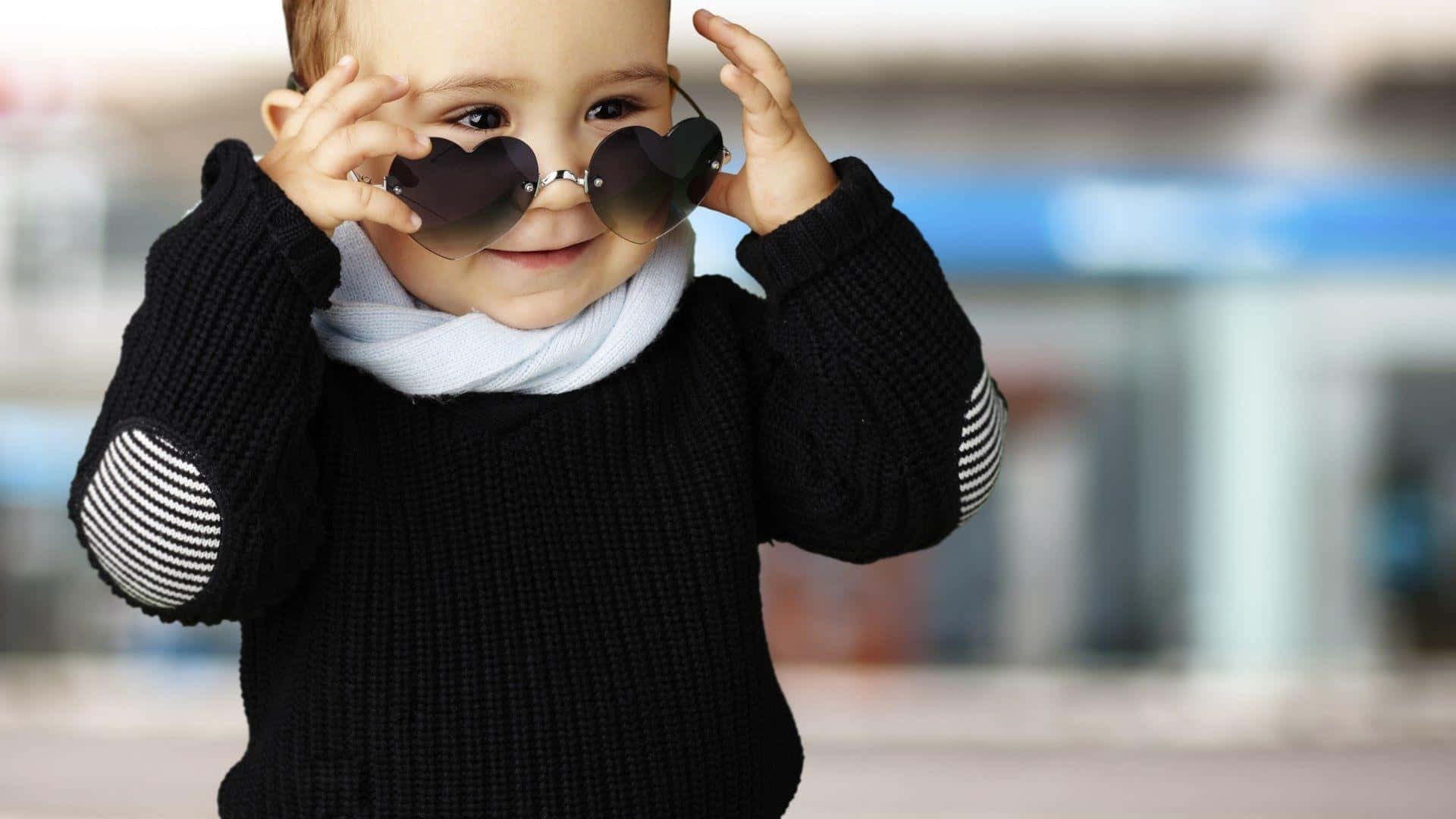 Stylish Boy Wearing Heart Sunglasses Background