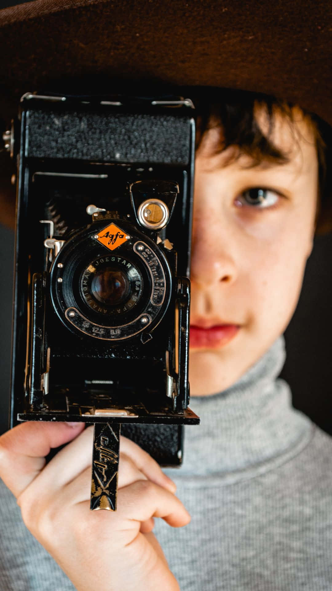 Stylish Boy With Retro Camera Background