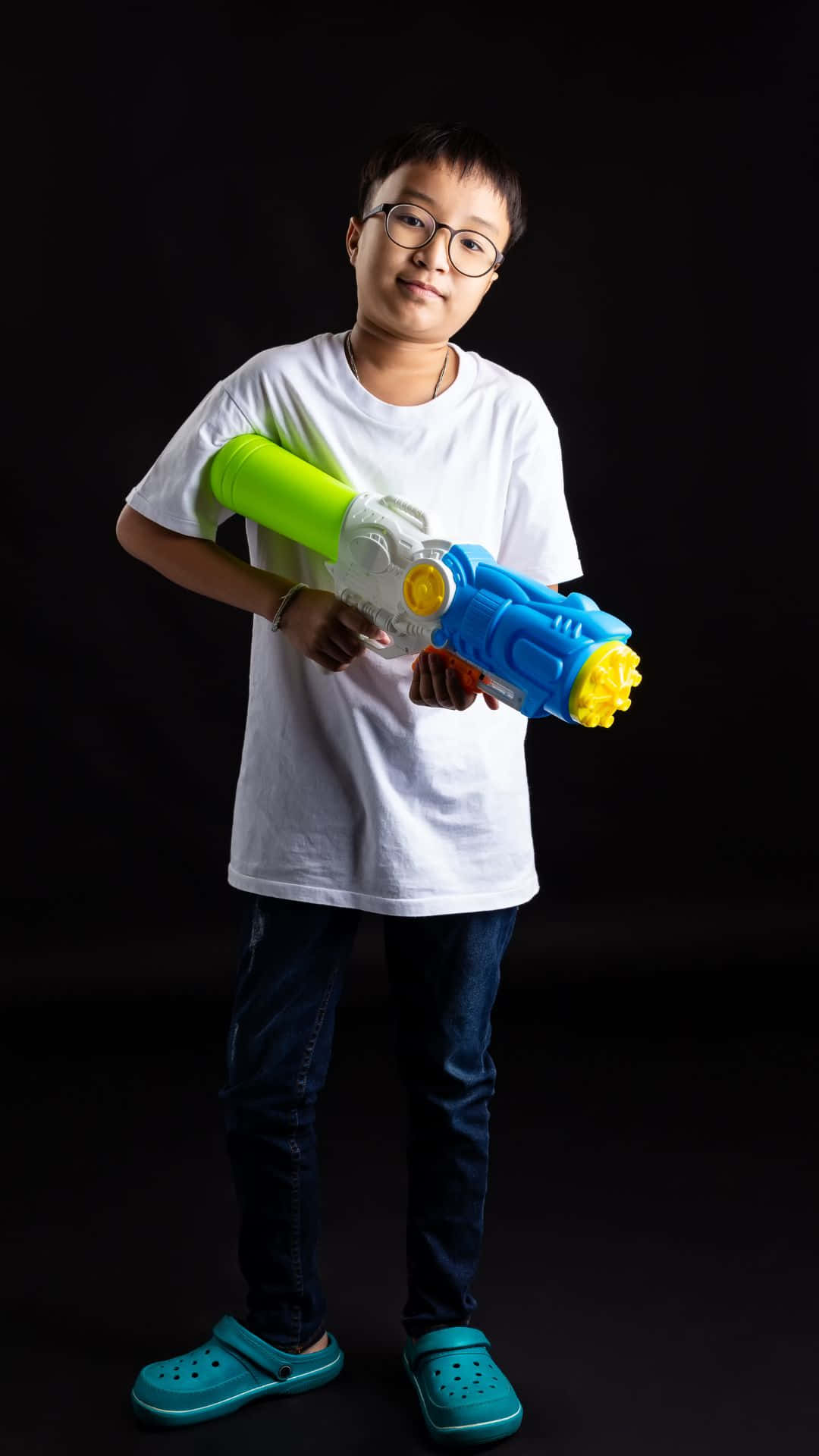 Stylish Boy With Water Gun Background