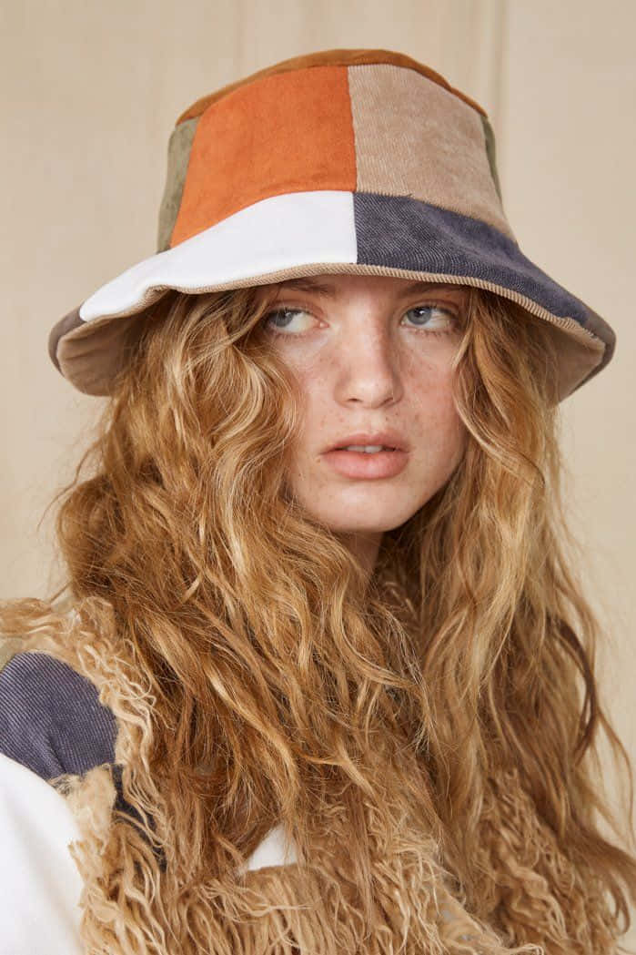 Stylish Fedora Hat On Flat Surface Background