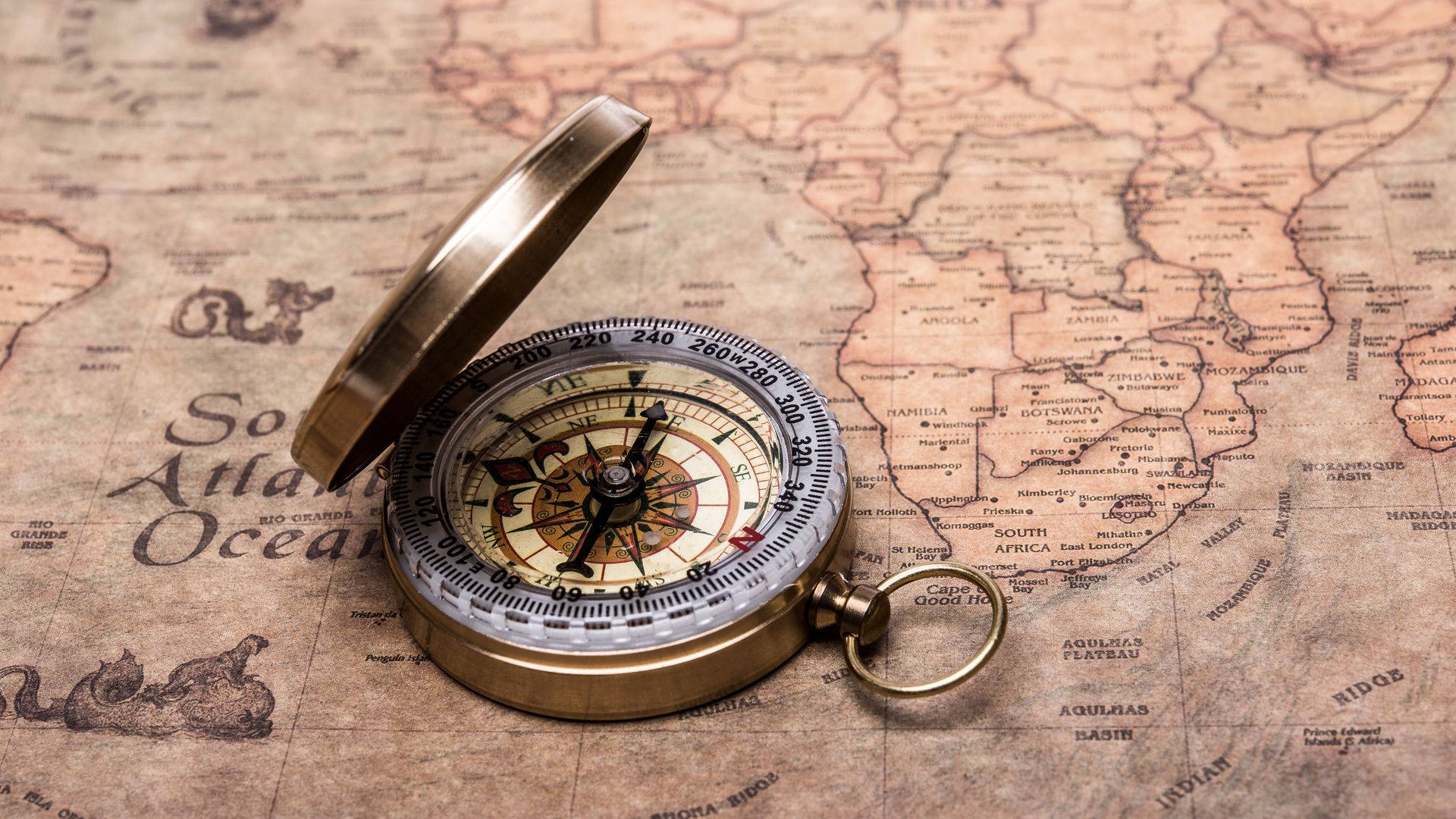 Stylish Golden Pocket Compass Background