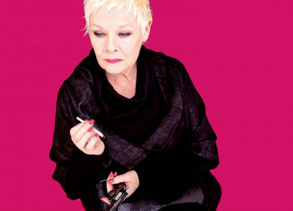 Stylish Judy Dench With Cigarette Background