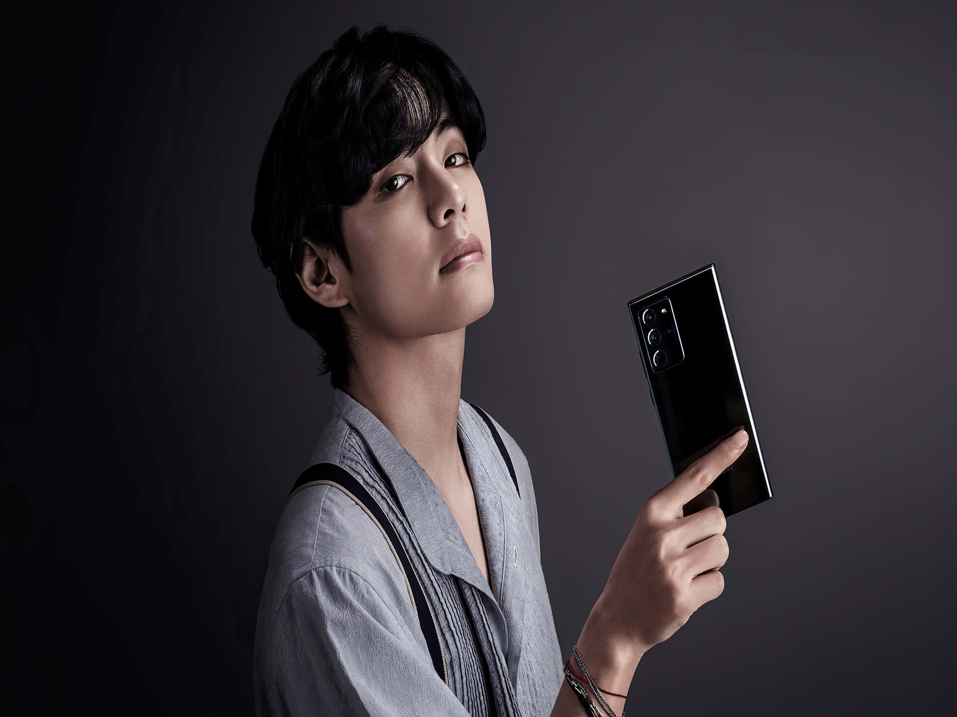 Stylish Man Holding Smartphone Background