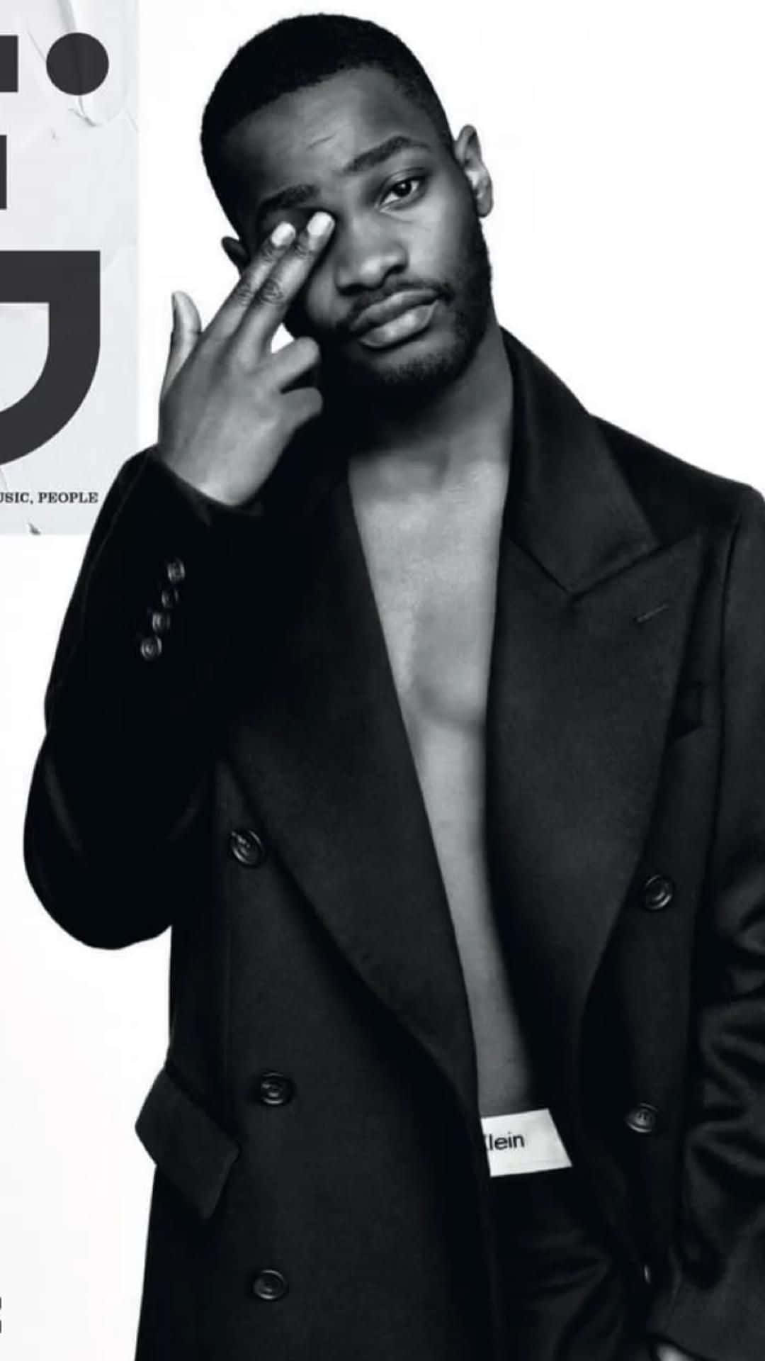 Stylish_ Man_ In_ Black_ Coat Background