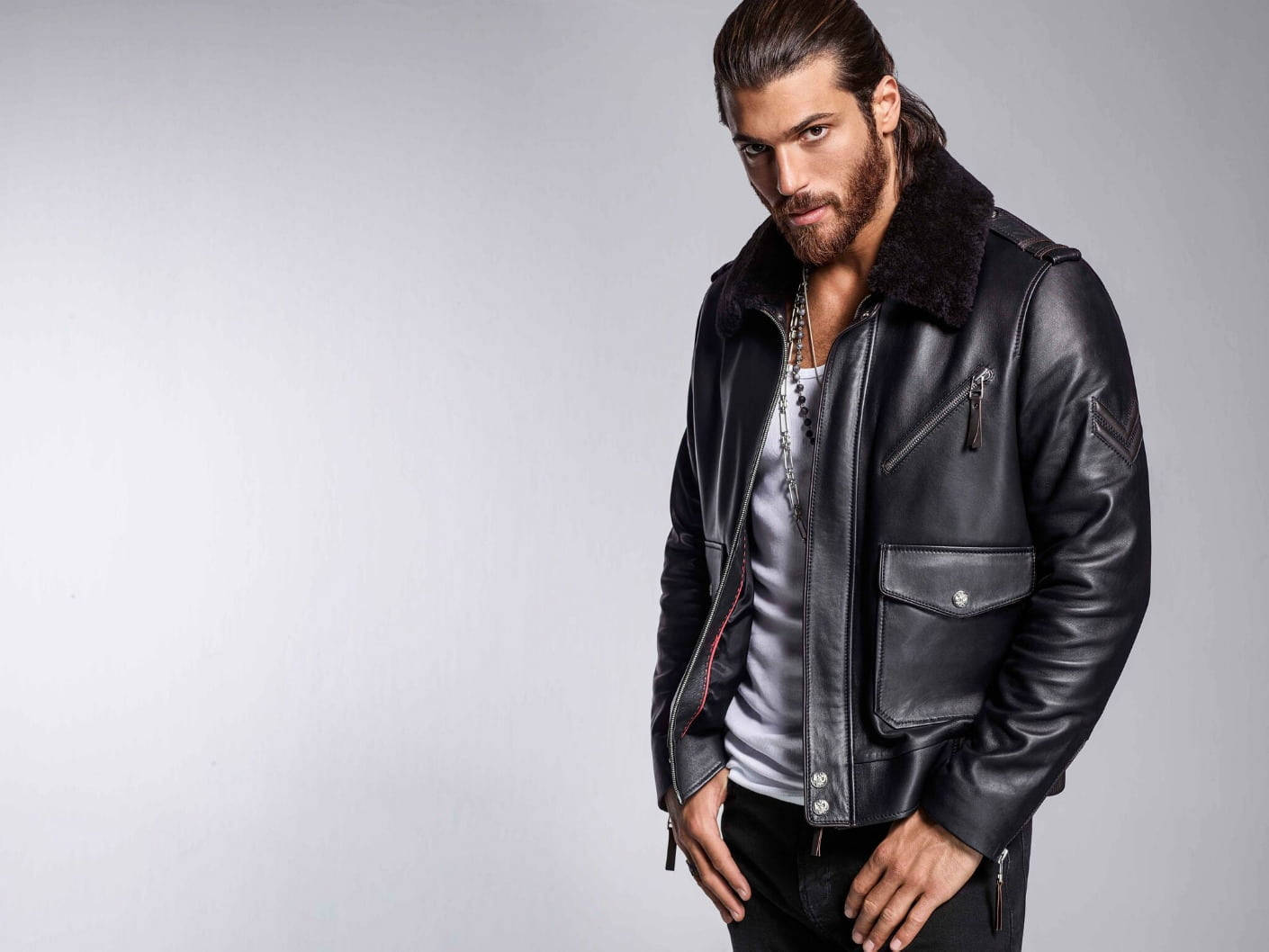 Stylish Man In Black Leather Jacket Background