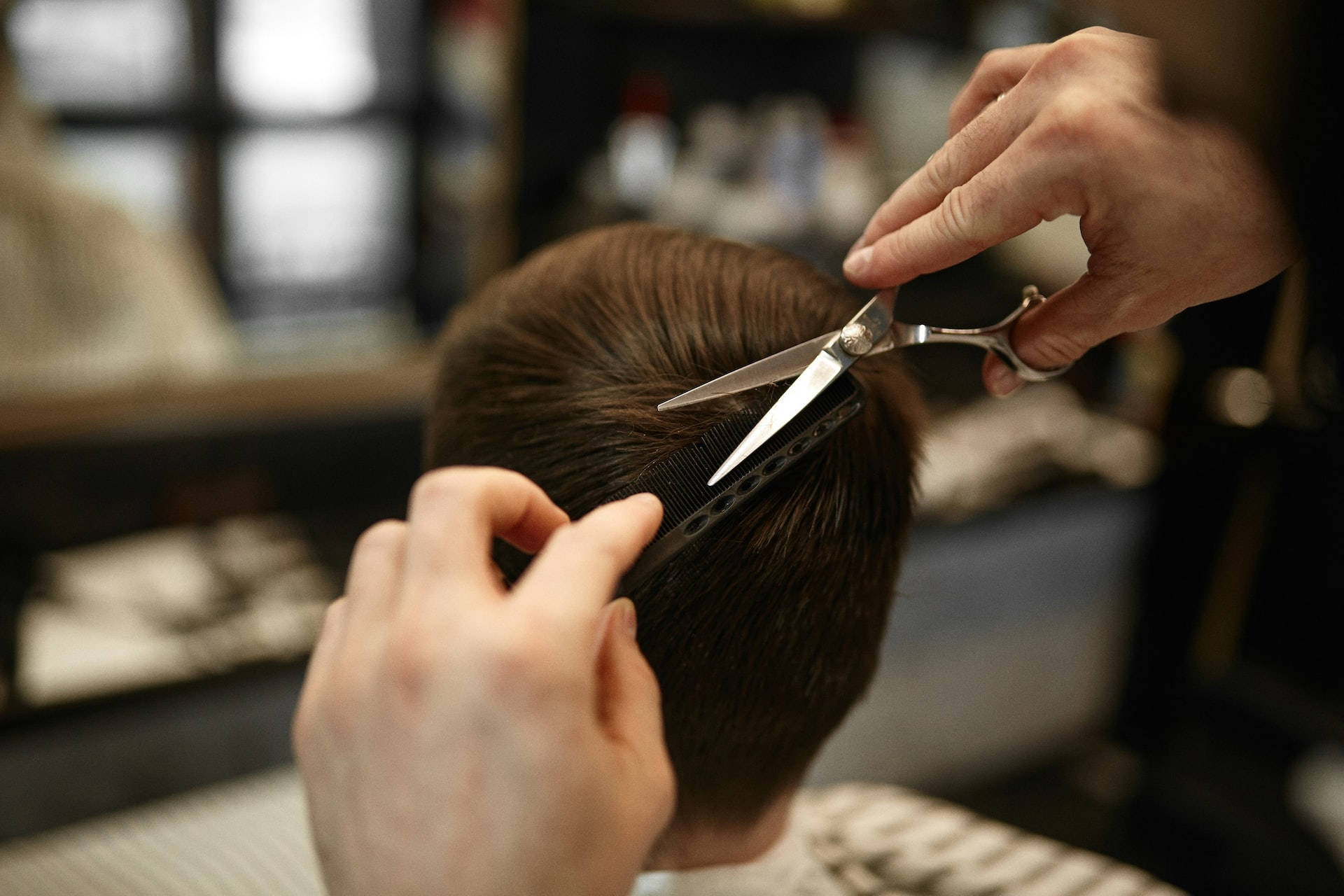 Stylish Men's Haircut Back View Background