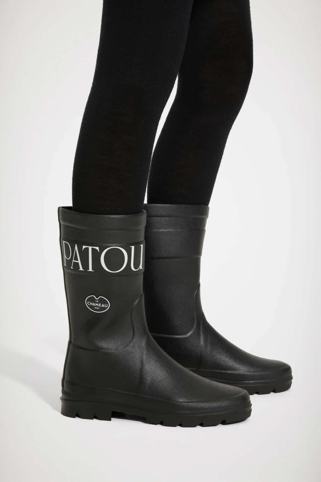 Stylish Patou X Le Chameau Black Boots Background