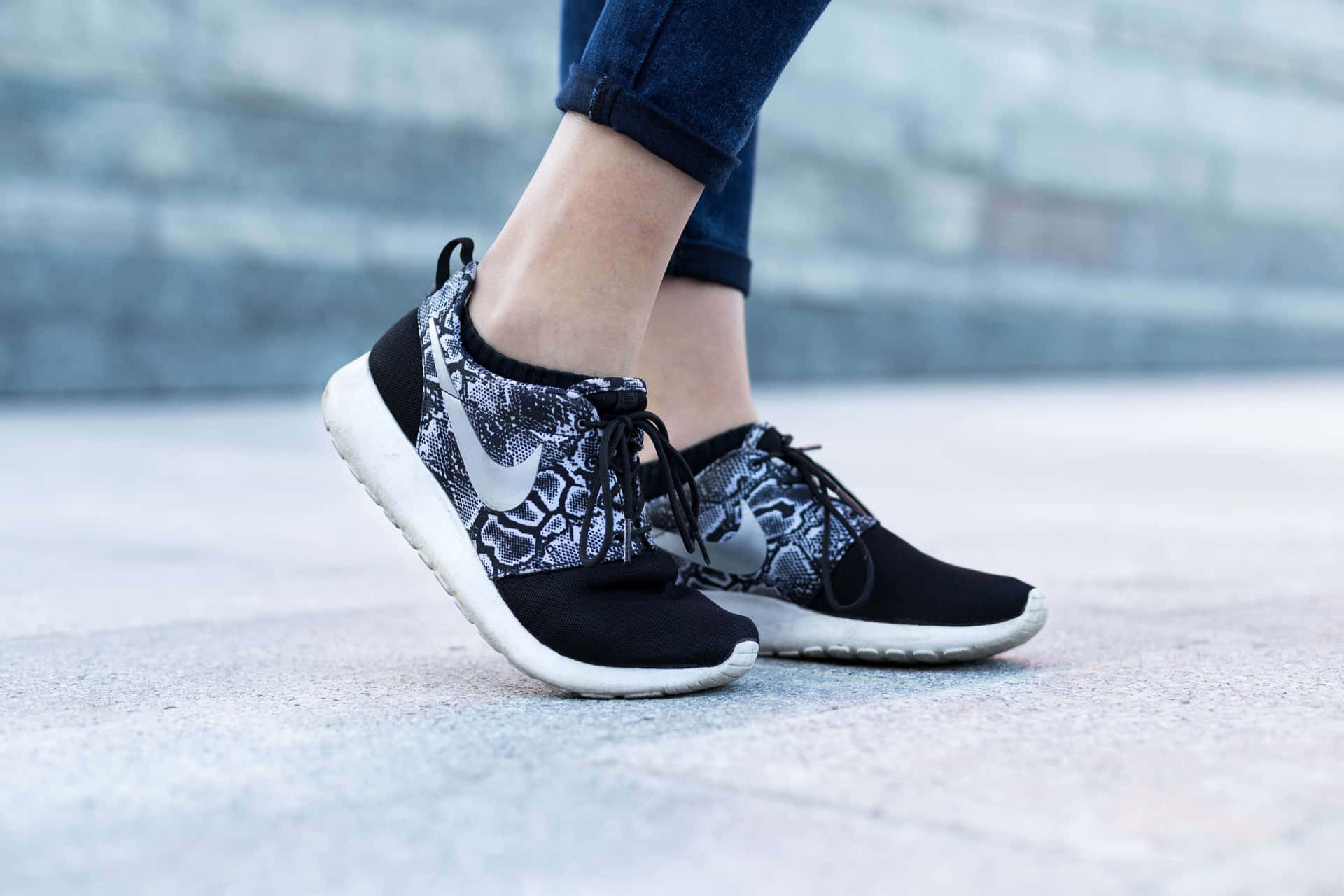 Stylish Woman Wearing Nike Roshe One Winter Sneakers