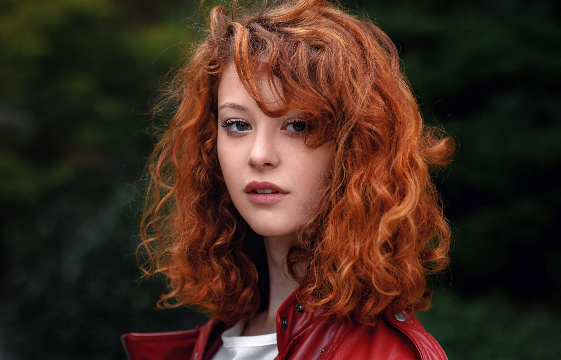 Stylish Woman With Vibrant Orange Curly Hair