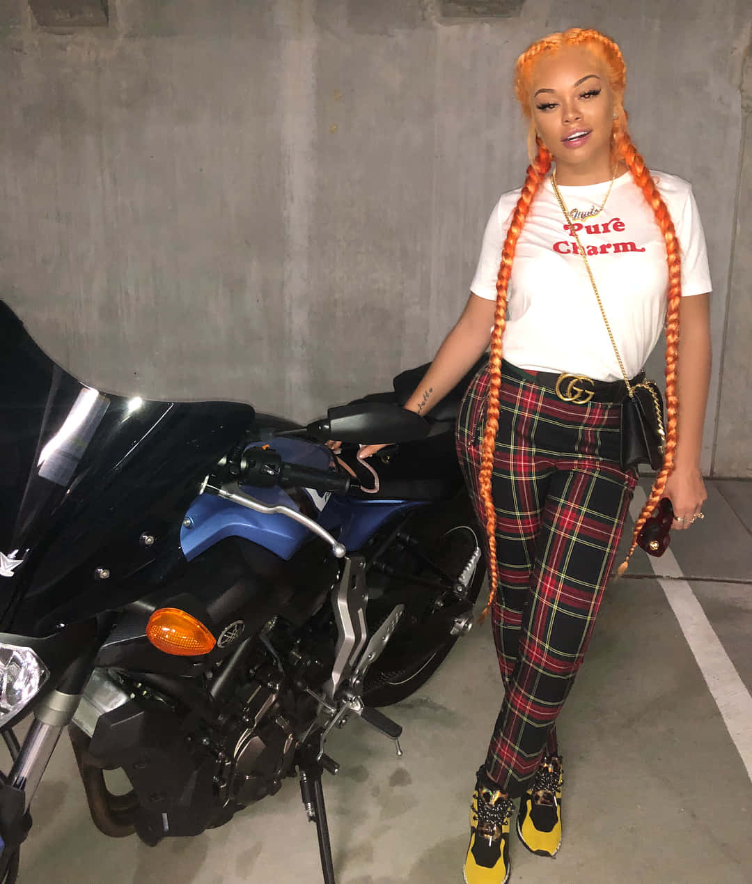 Stylish Womanwith Motorcycle Background