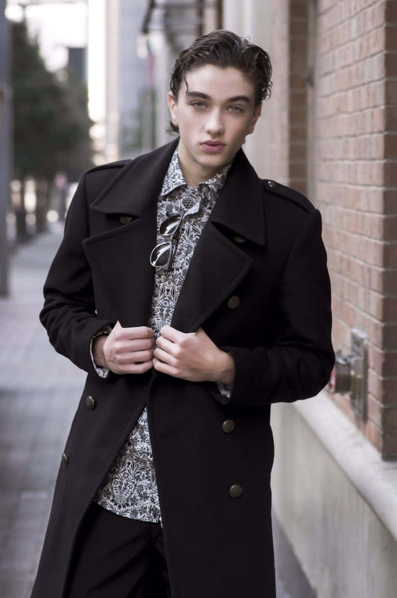 Stylish Young Manin Black Coat Background