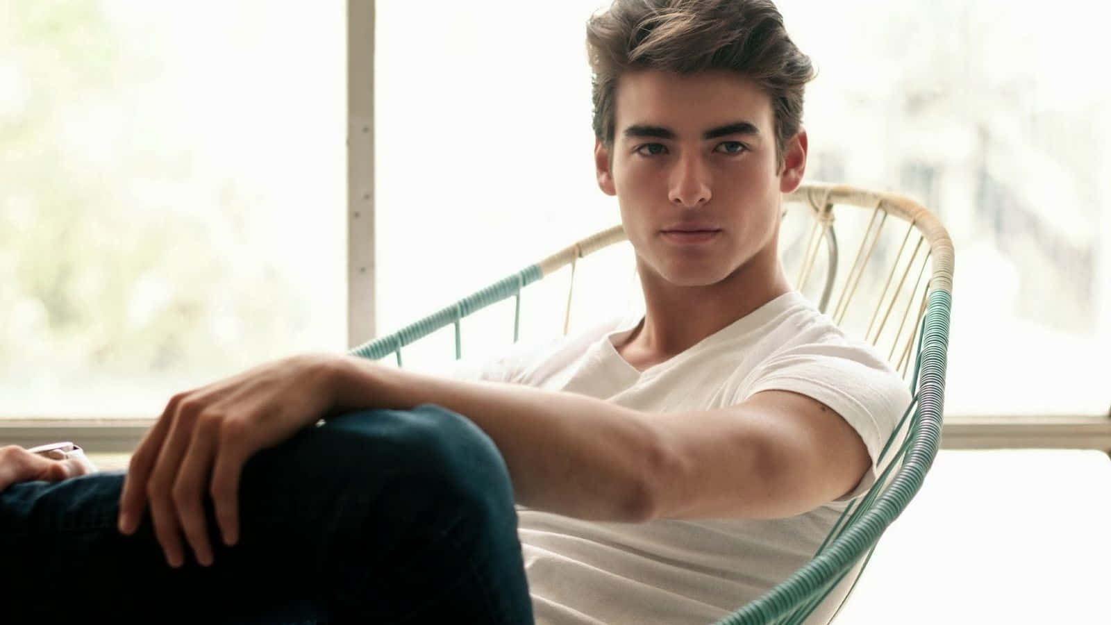 Suave Model Holding Leg [wallpaper] Background