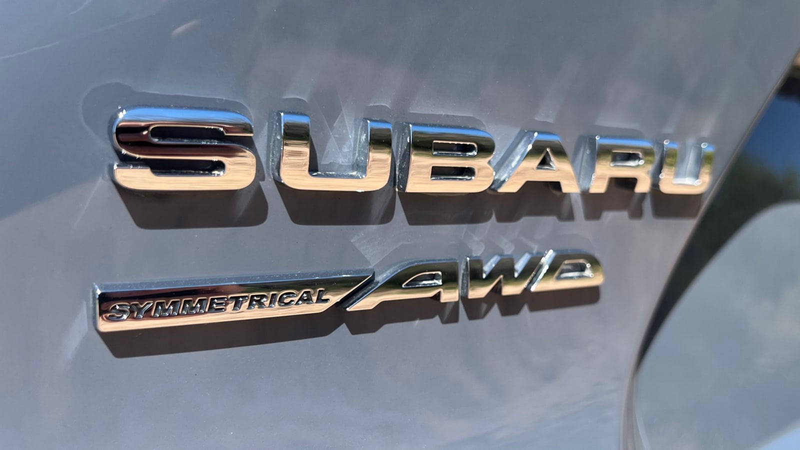 Subaru Logo Text On Car Background