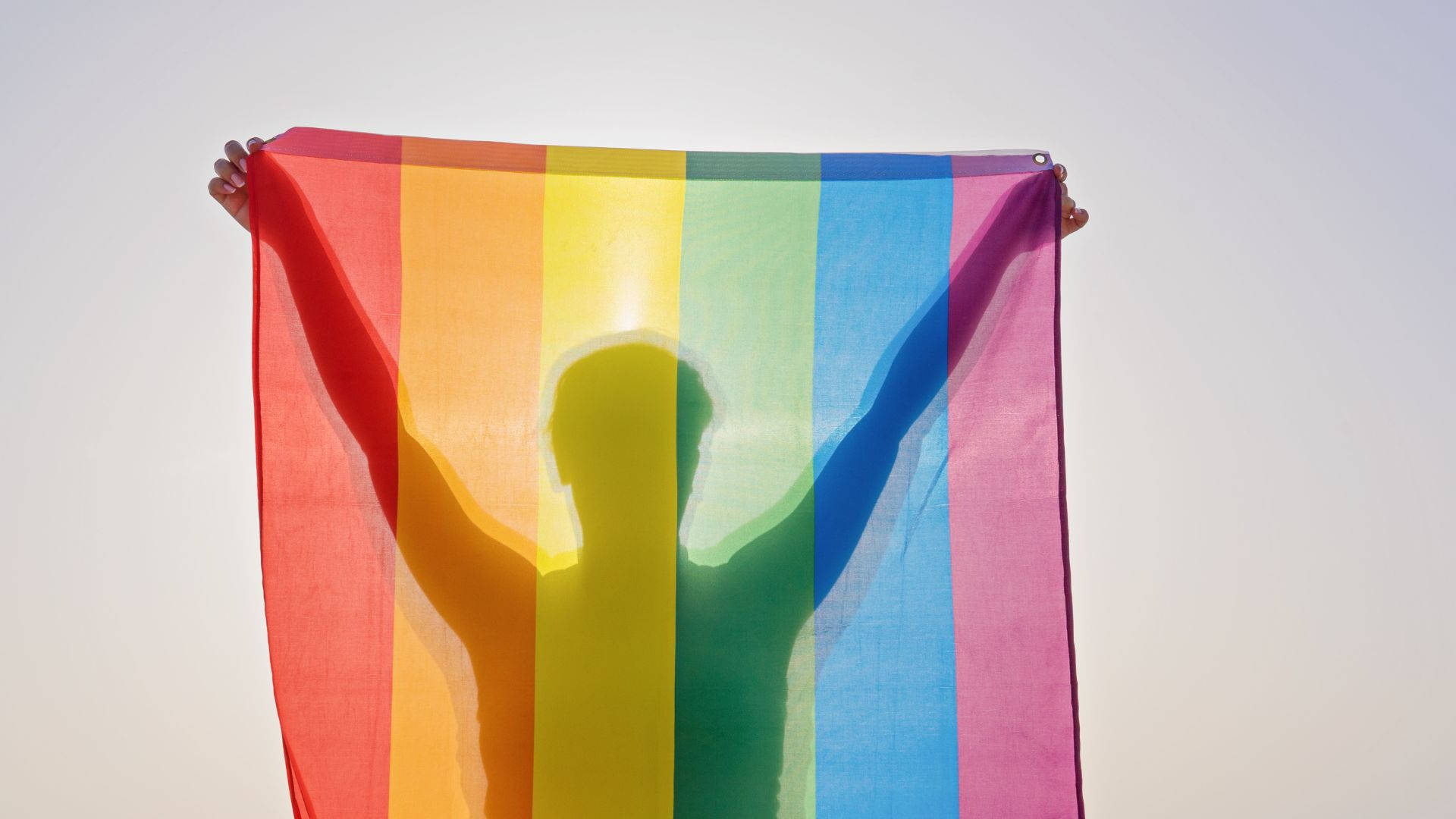 Subtle Lgbt Silhouette Raising Flag Background