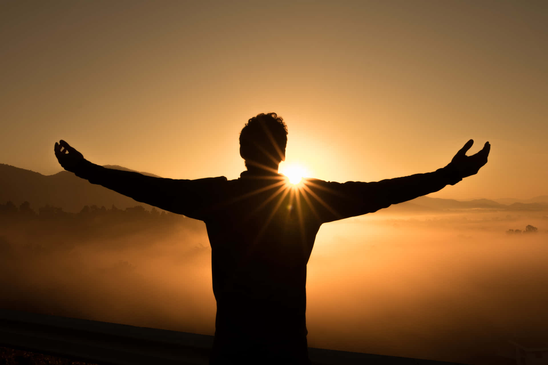 Successful Man Against Sunset Background