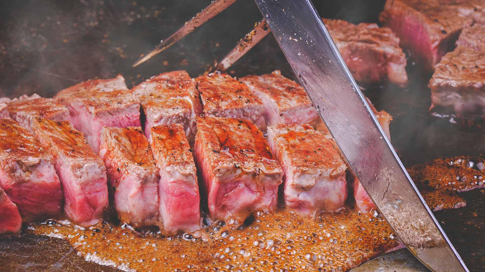 Succulent Cubed Kobe Beef Prepared To Perfection Background