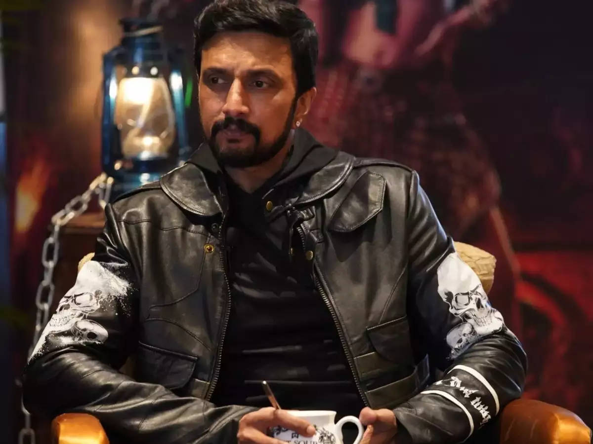 Sudeep In Black Leather Jacket Background