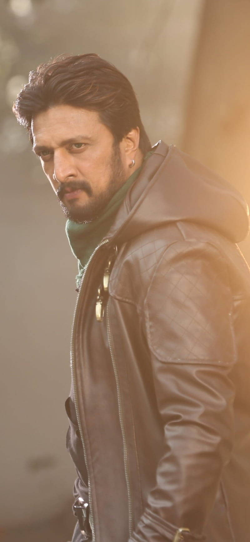 Sudeep In Leather Jacket Background