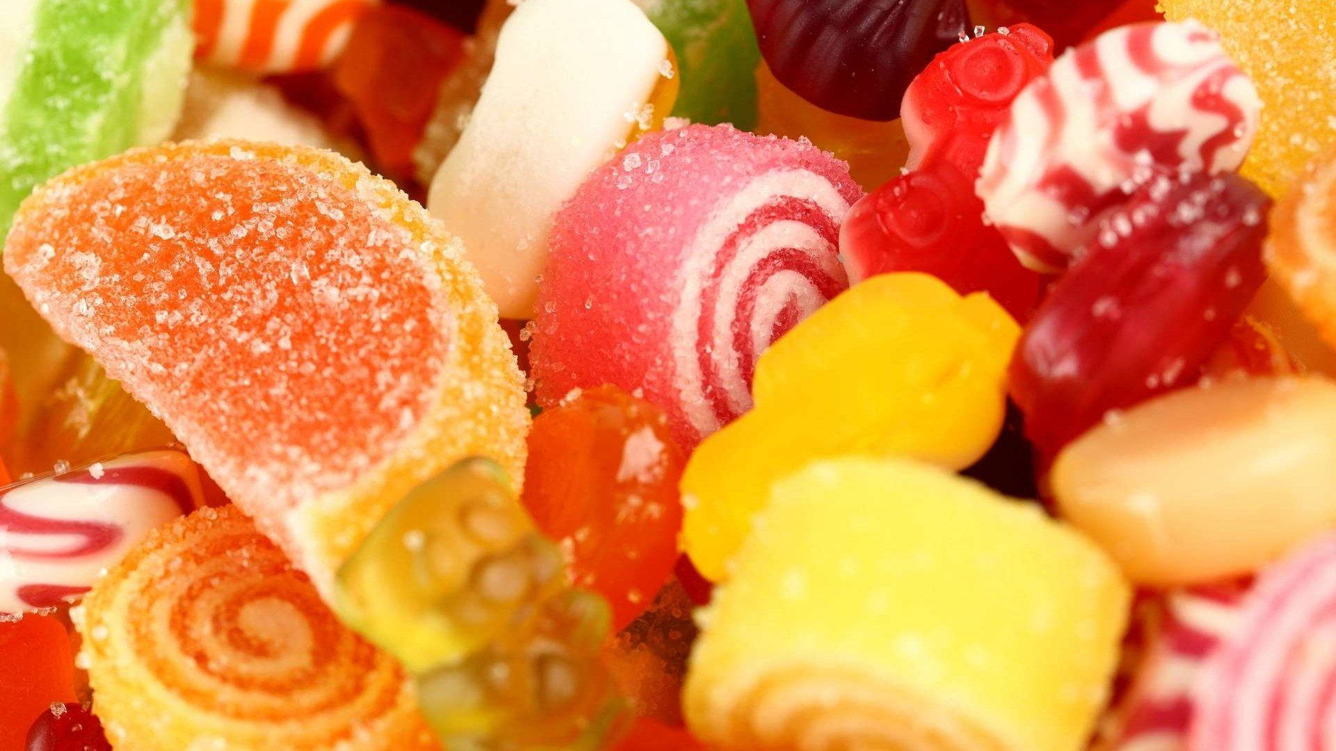 Sugar Coated Candies In Different Sizes And Shapes