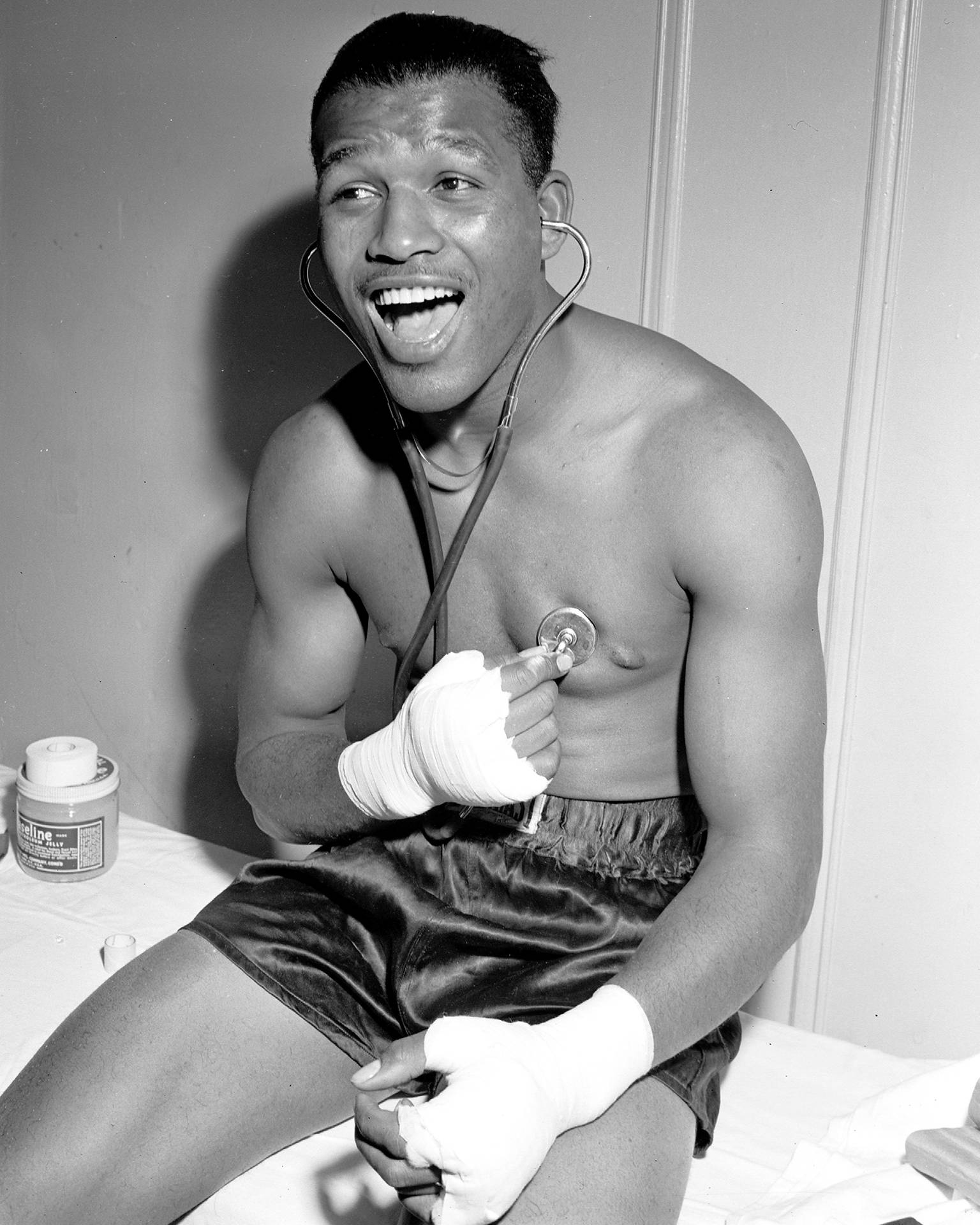 Sugar Ray Robinson With A Stethoscope Background